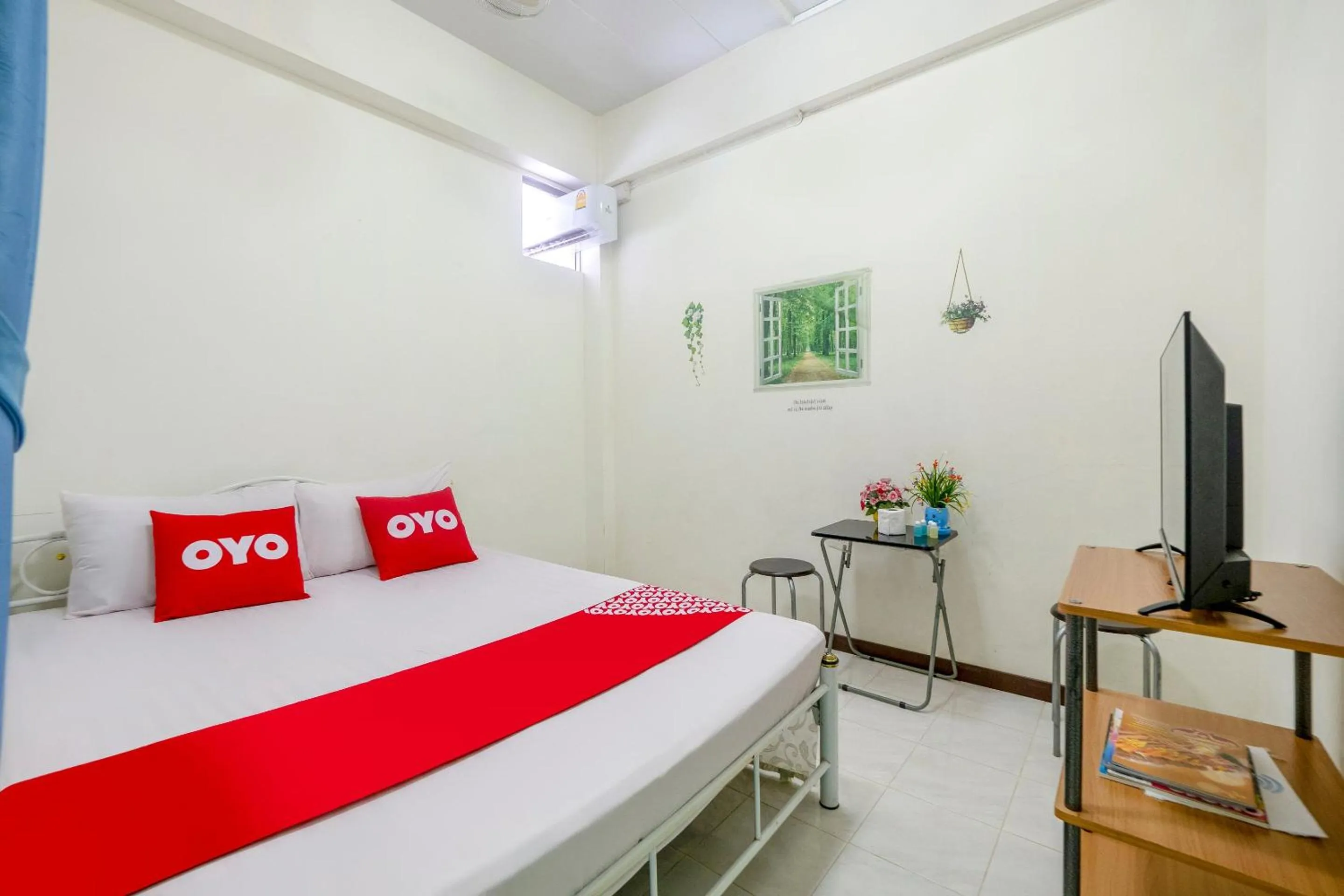 Bedroom in OYO 906 Bann One Love