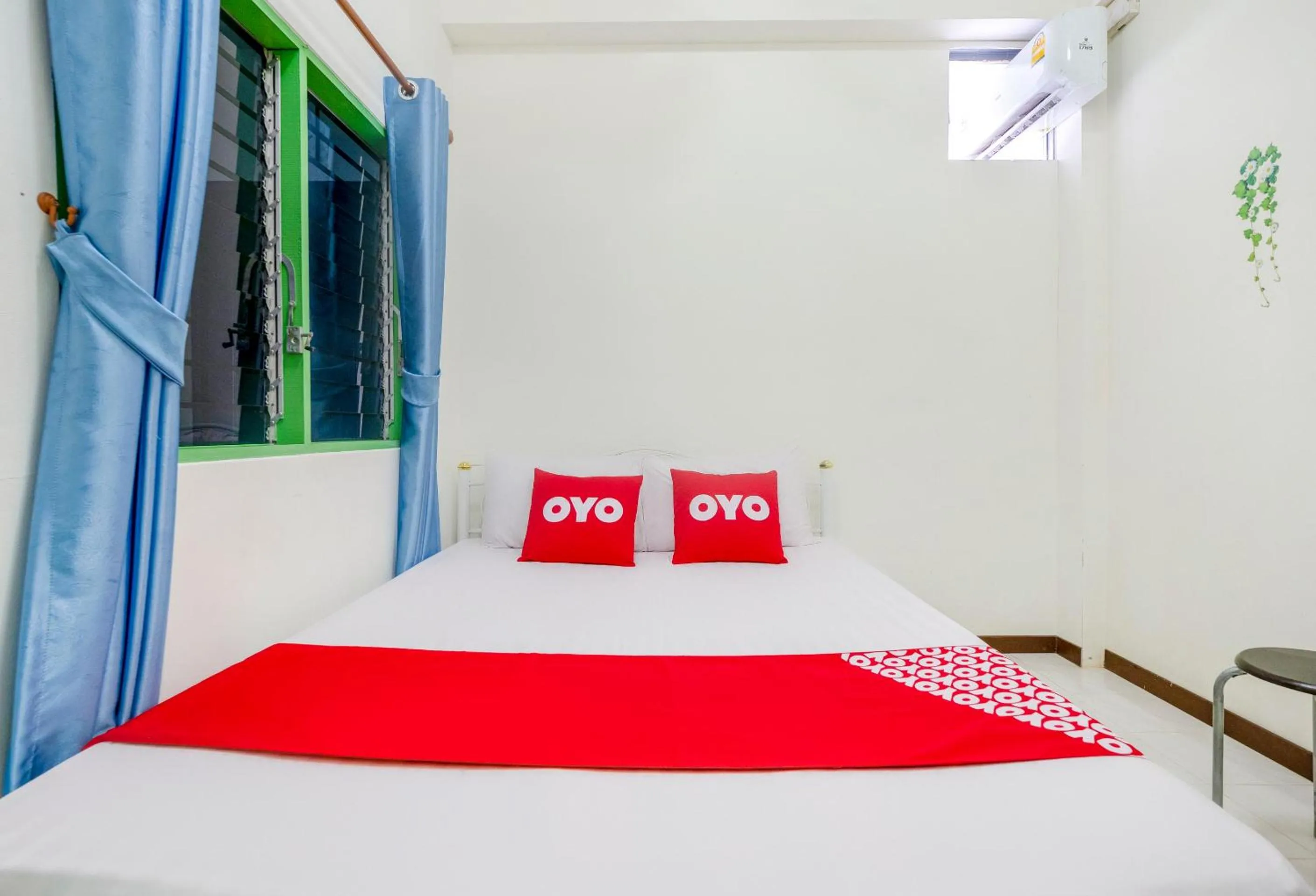 Bedroom in OYO 906 Bann One Love