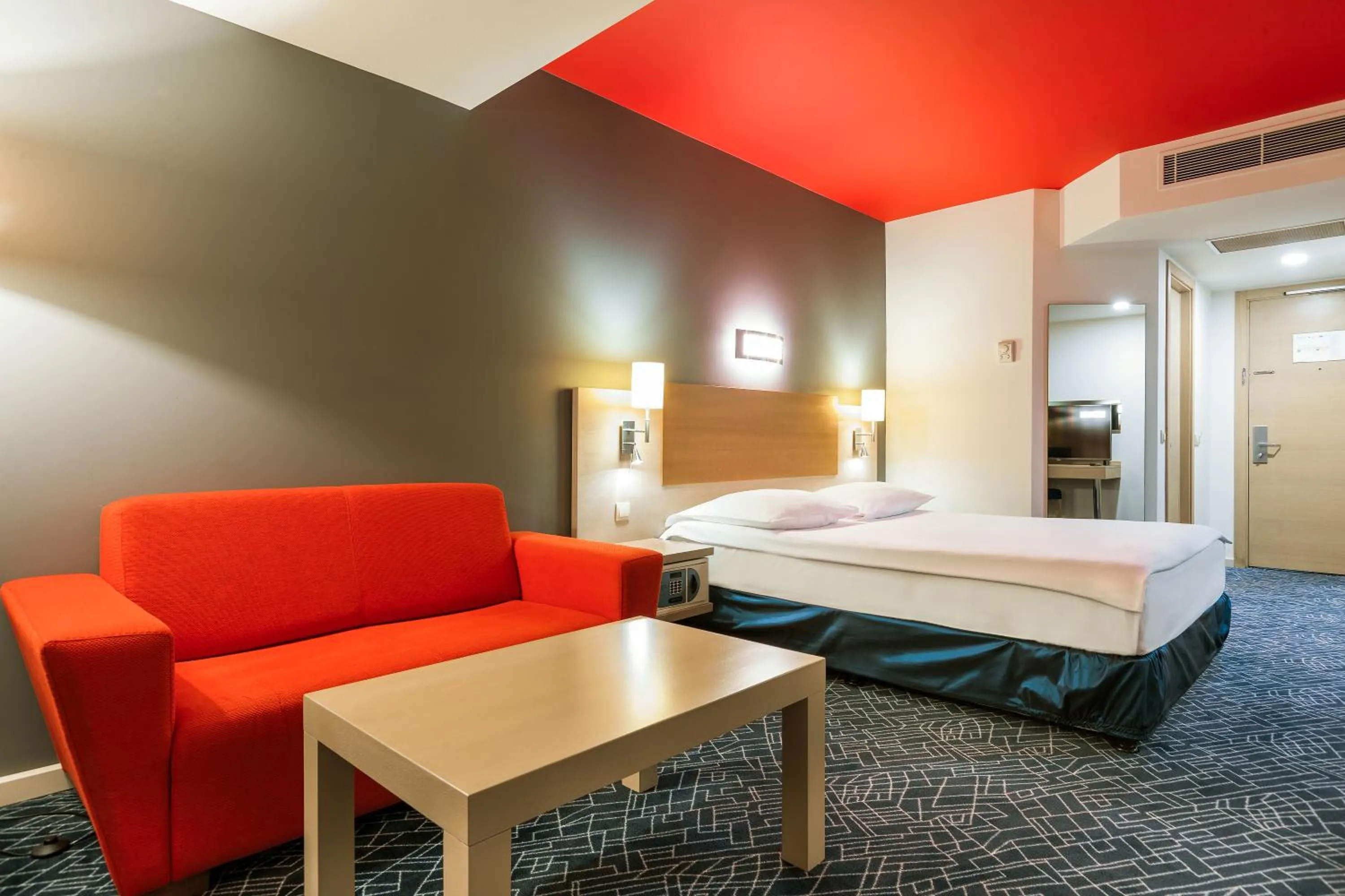 Living room, Bed in Radisson Hotel Baku