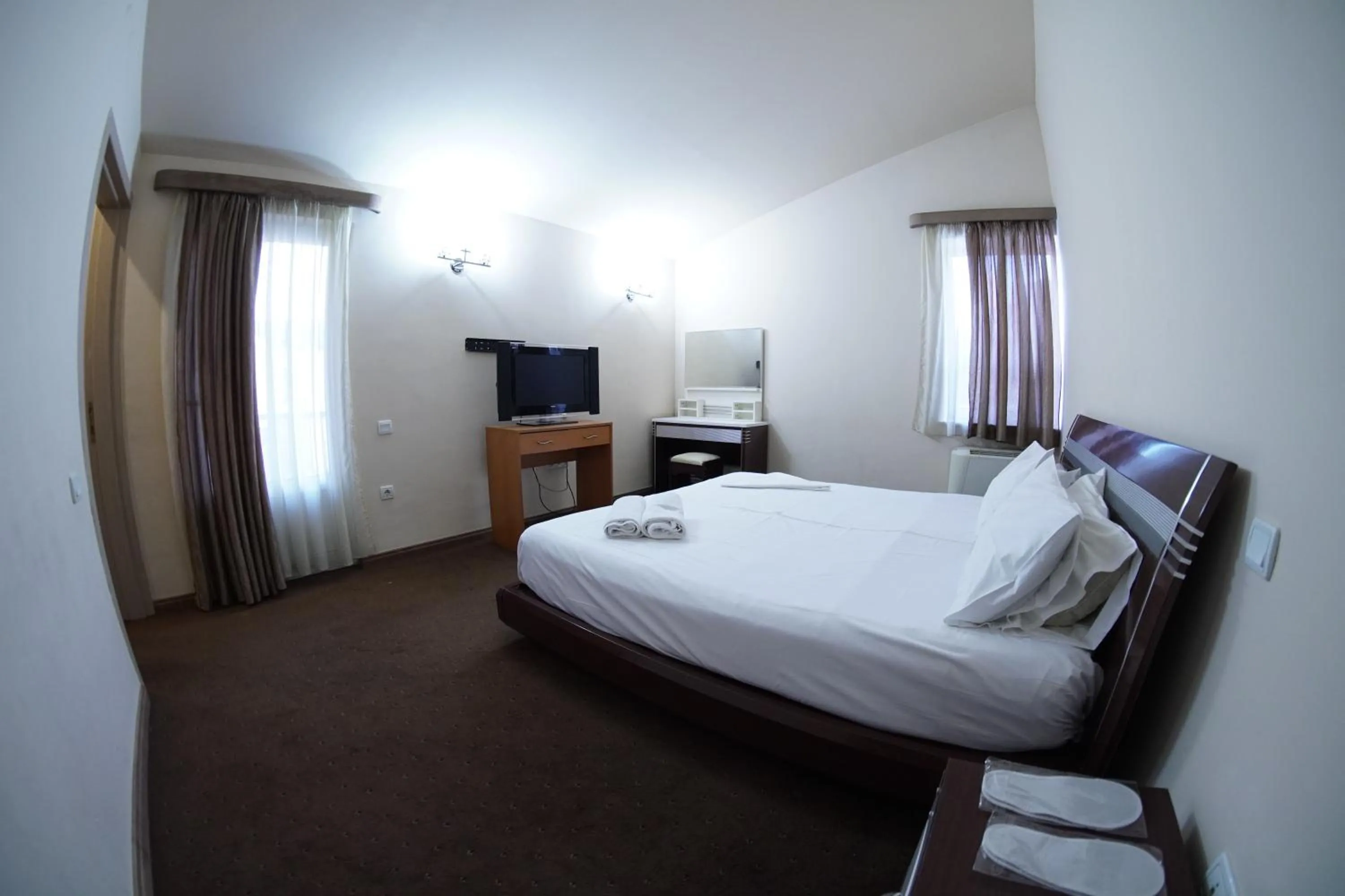 Bed in Aquapark Hotel & Villas