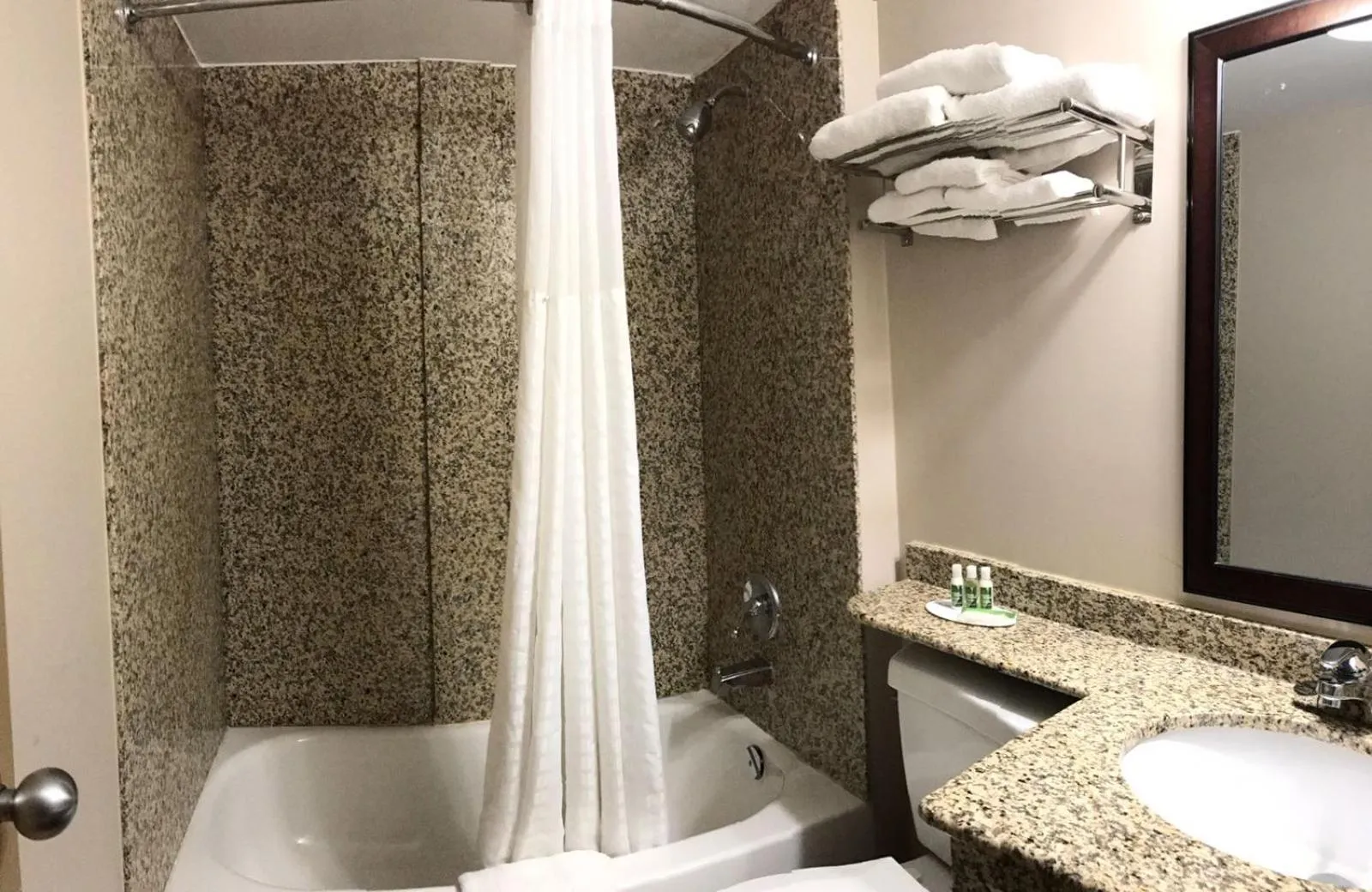 Bathroom in red maple inn and suites