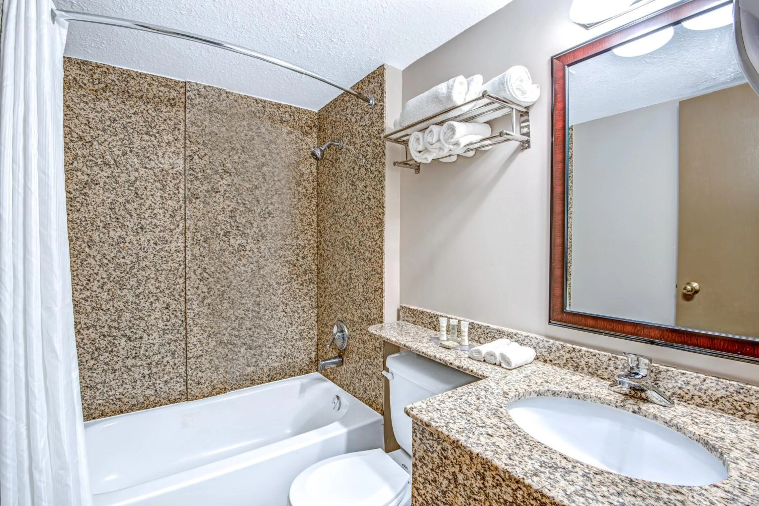 Bathroom in red maple inn and suites