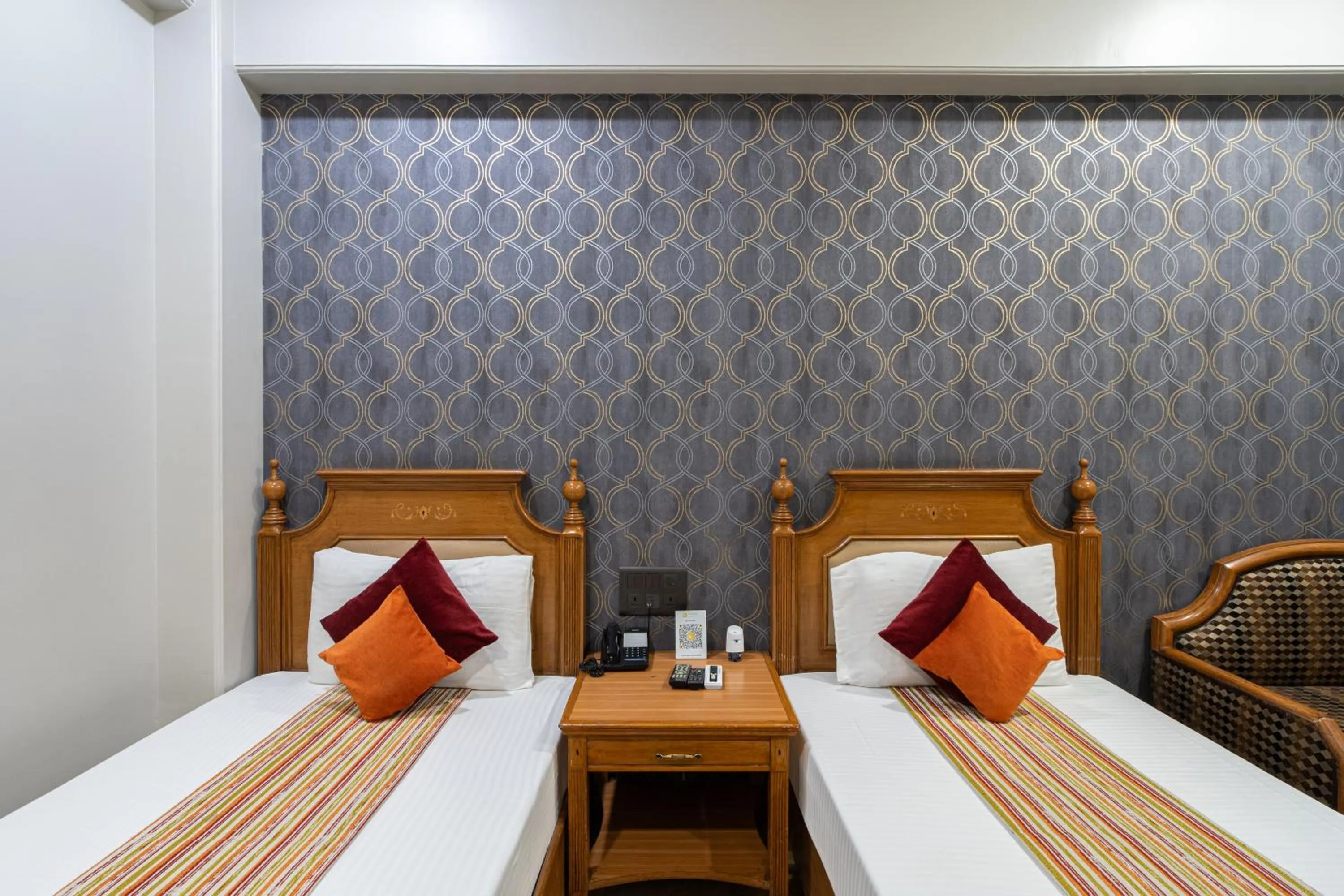 Bed in Hotel Sunstar Grand