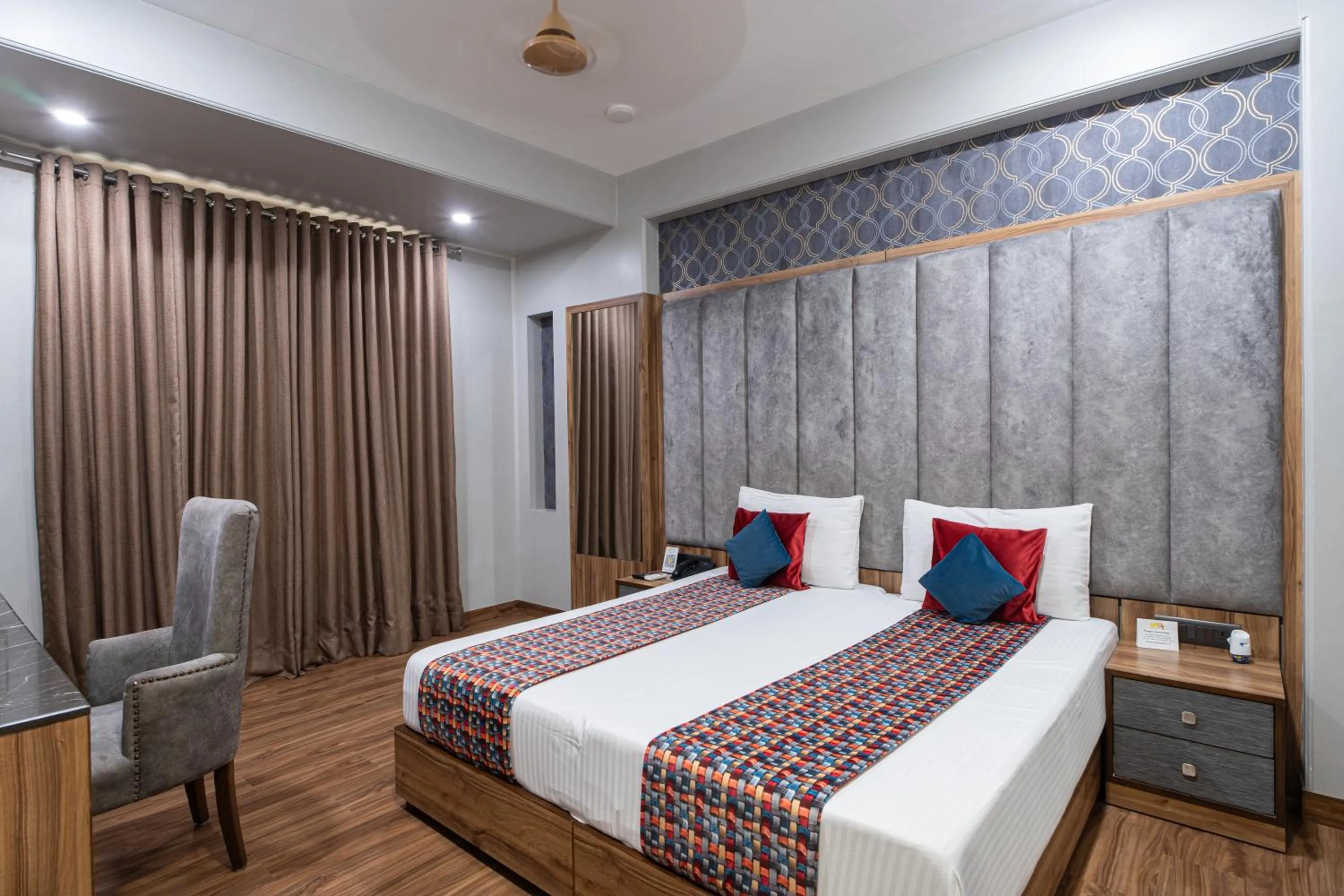 Bed in Hotel Sunstar Grand