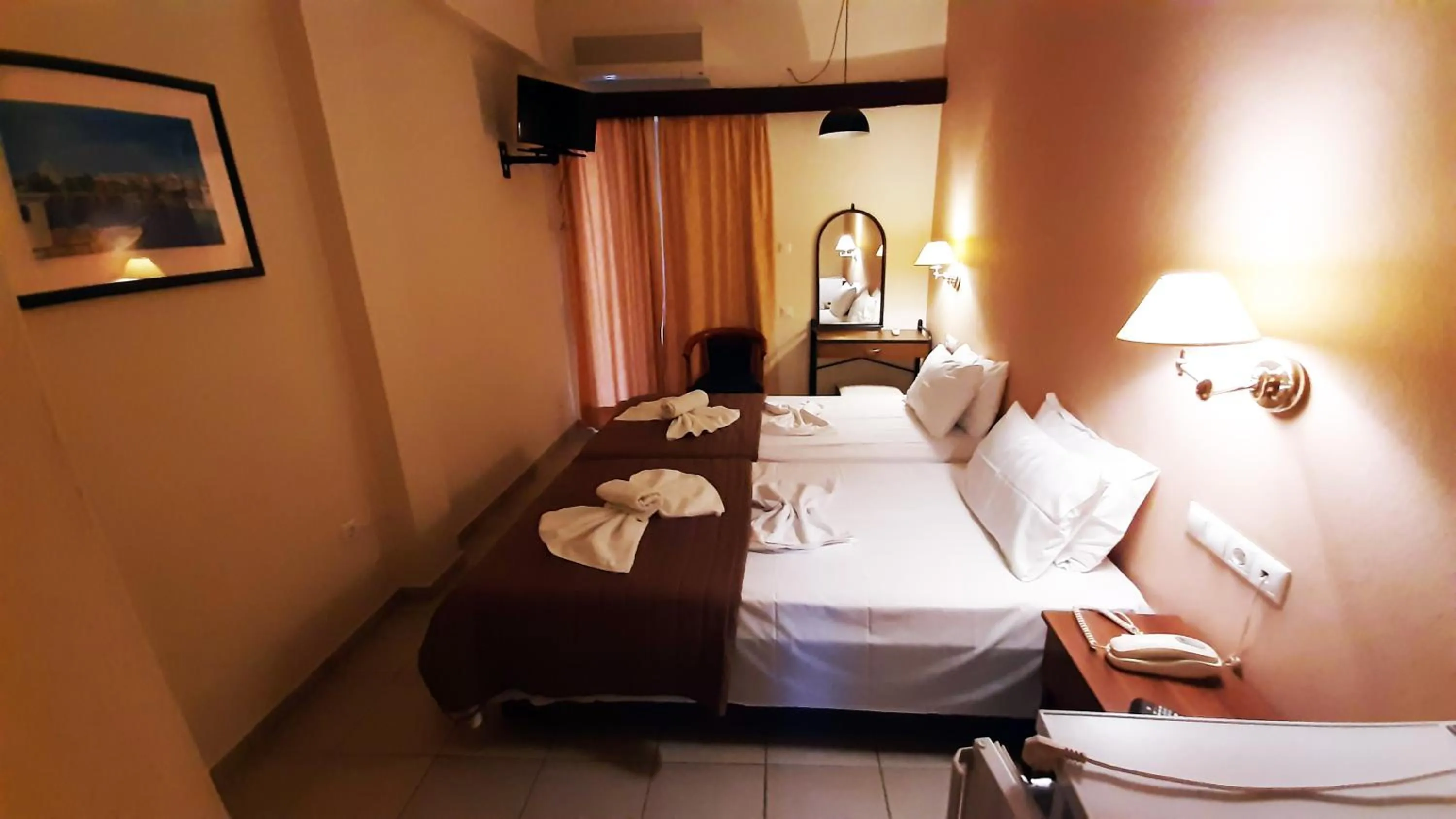 Bed in Mitho Hotel Spa