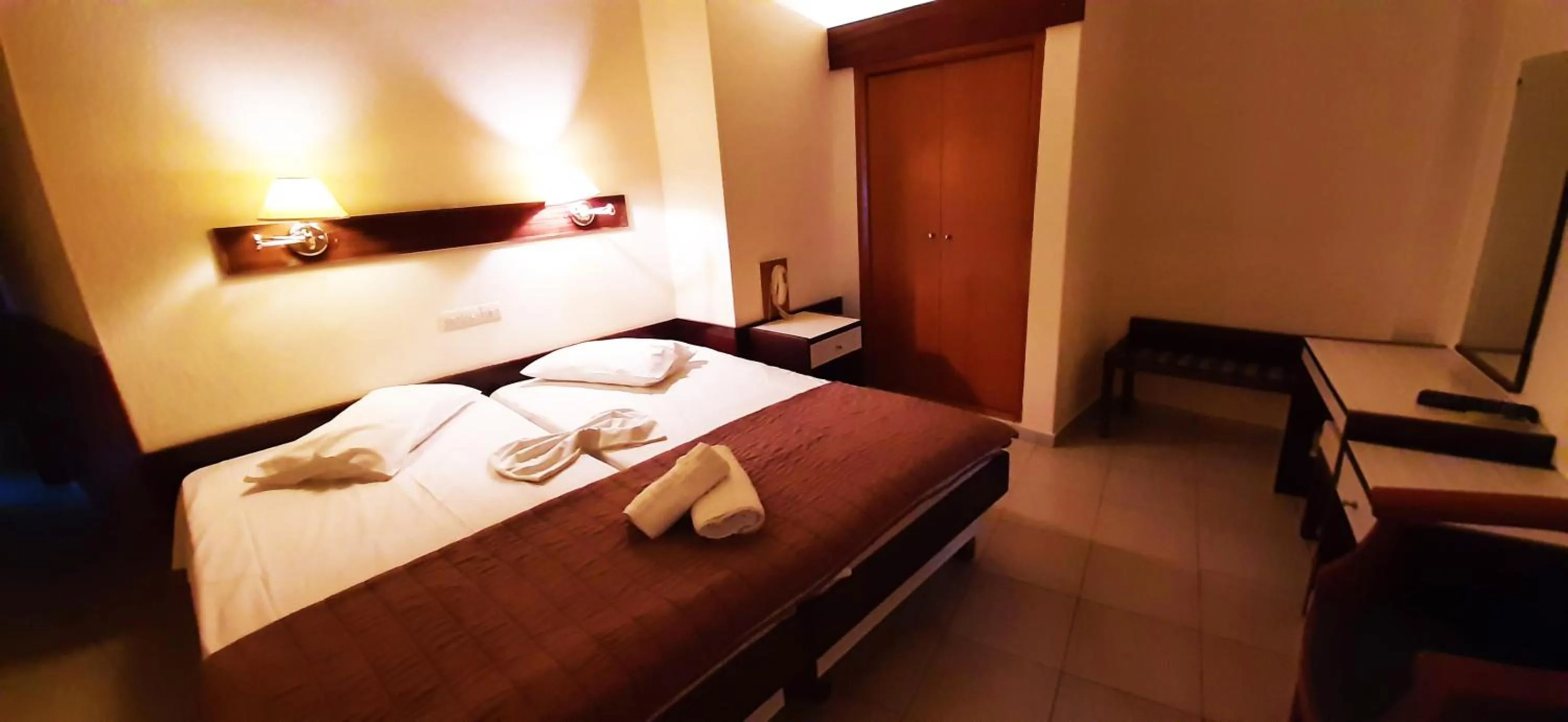 Bed in Mitho Hotel Spa