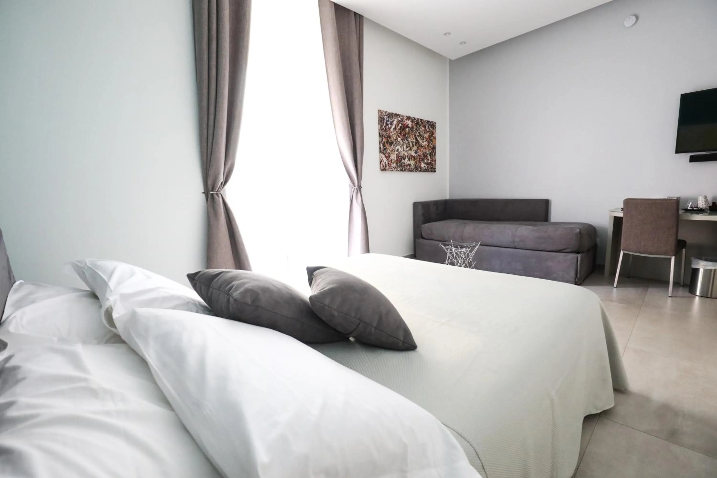 Bed in Toledo 16 Luxury Suites