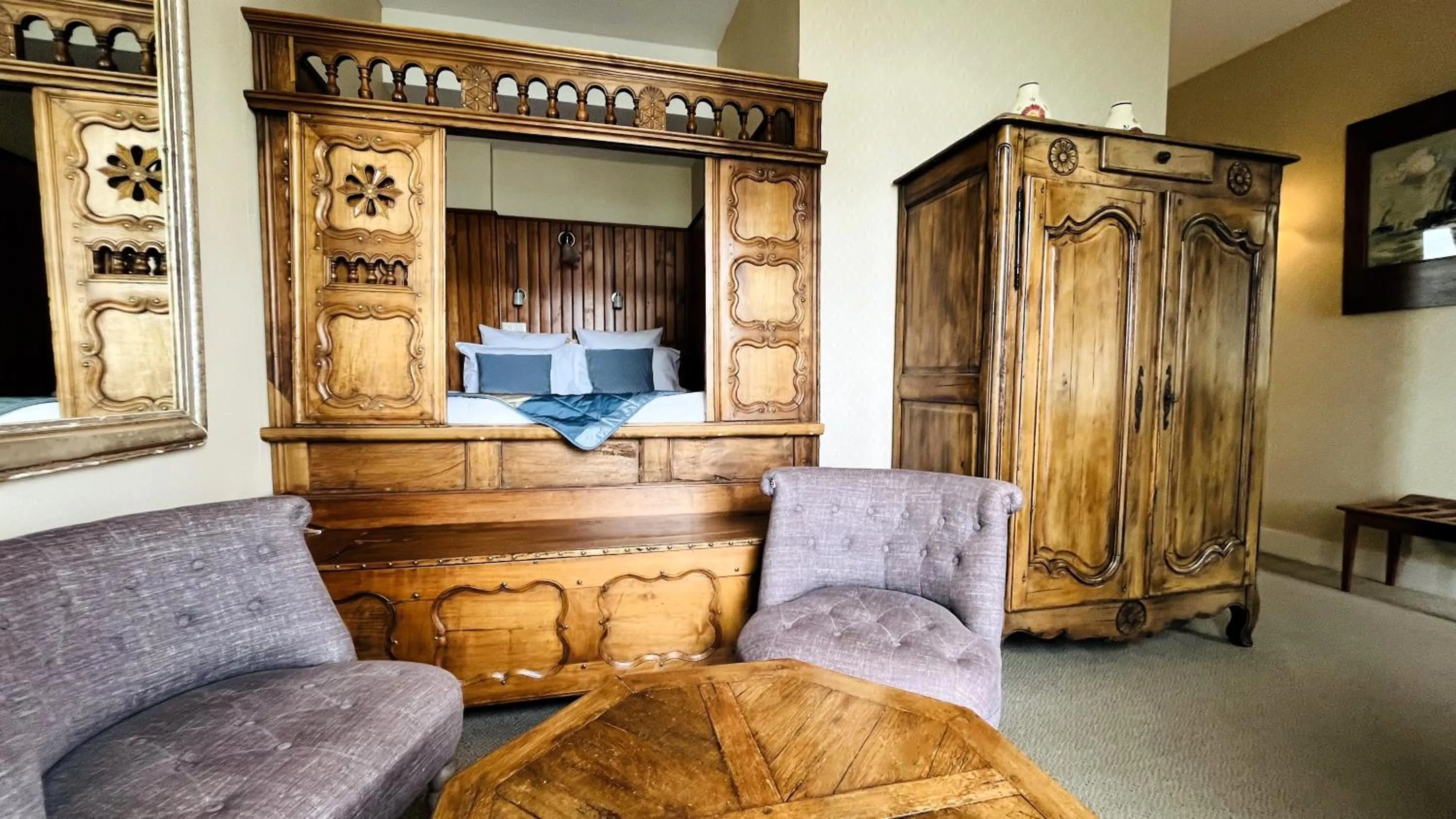 Bedroom in Logis Hôtel Restaurant le Printania