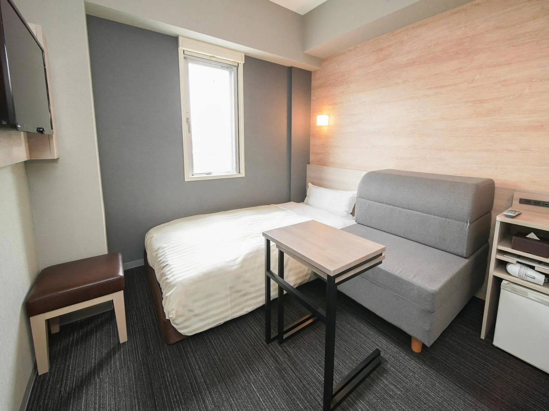 Bed in Super Hotel Kofu Showa Inter