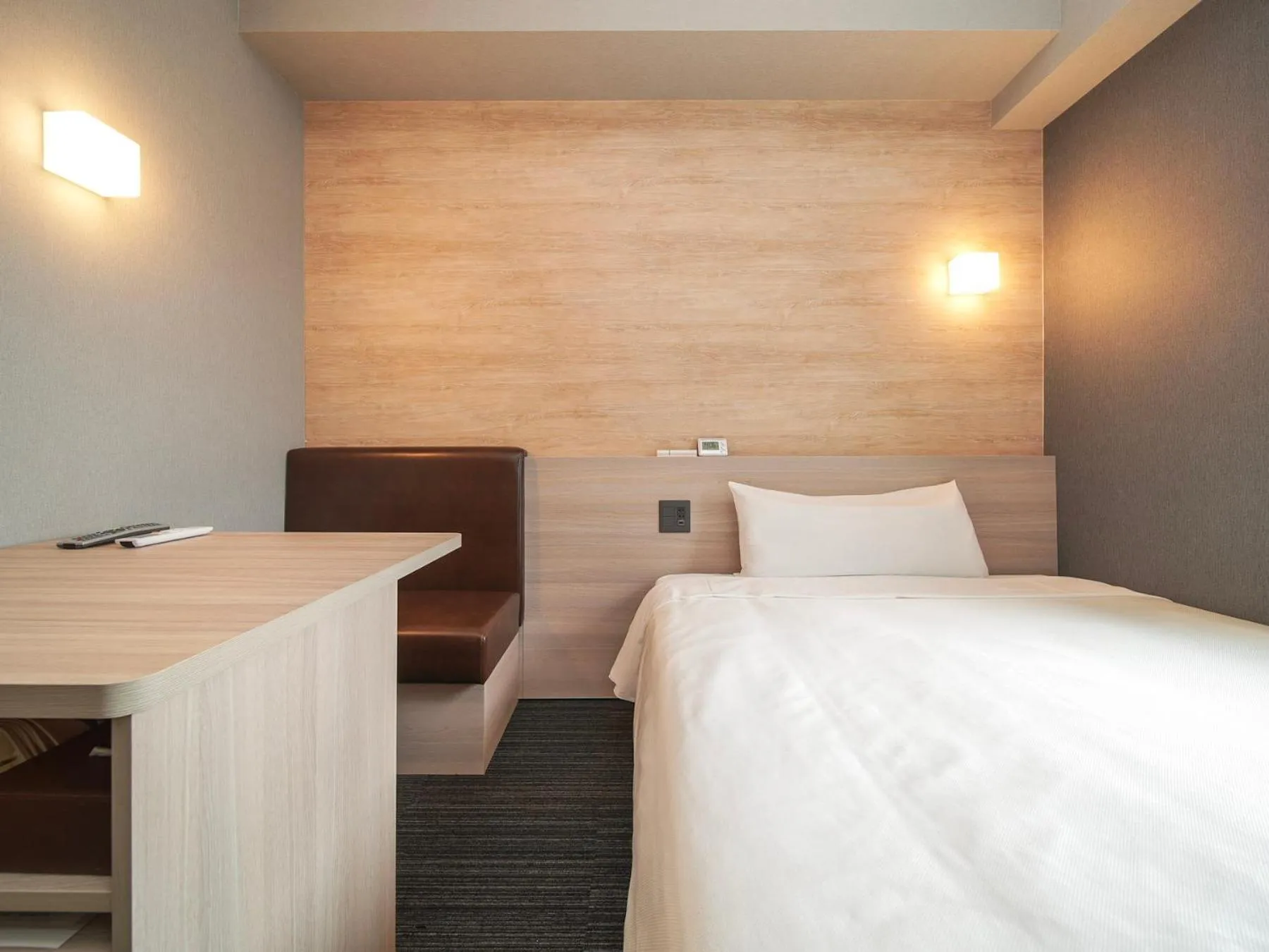 Bed in Super Hotel Kofu Showa Inter