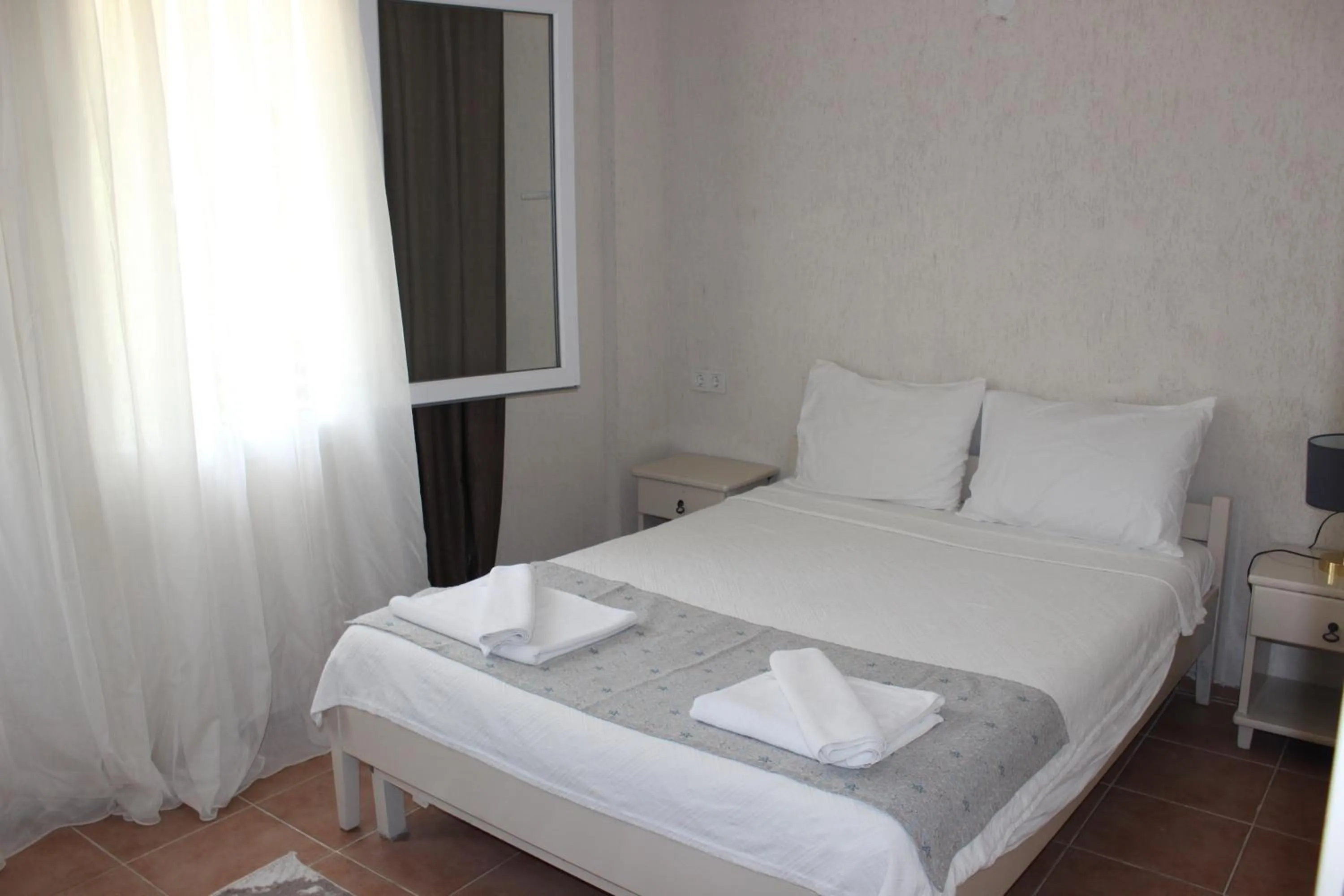 Bed in Tunacan Hotel