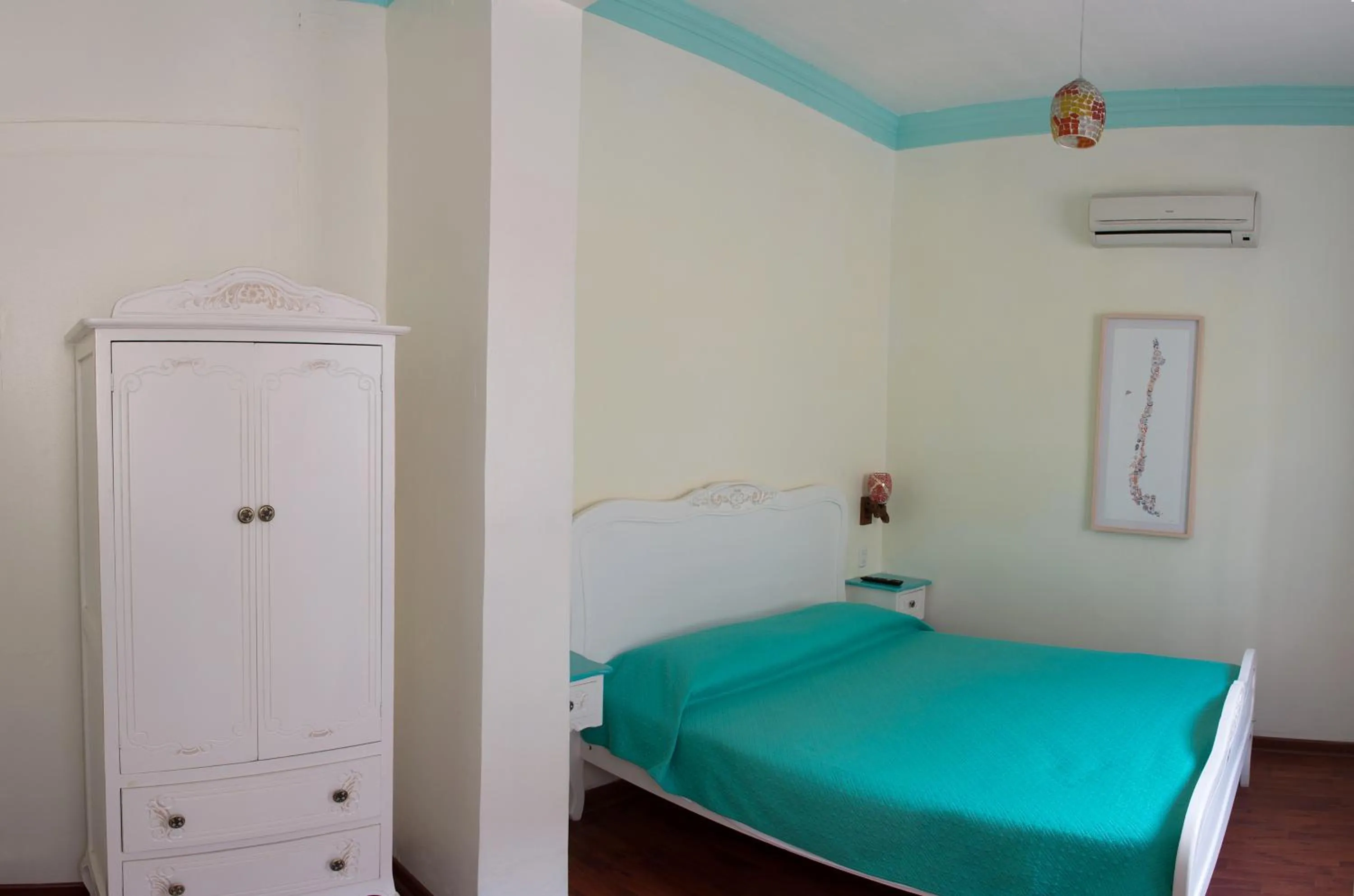 Bedroom, Bed in Hostal Casa Aborigen