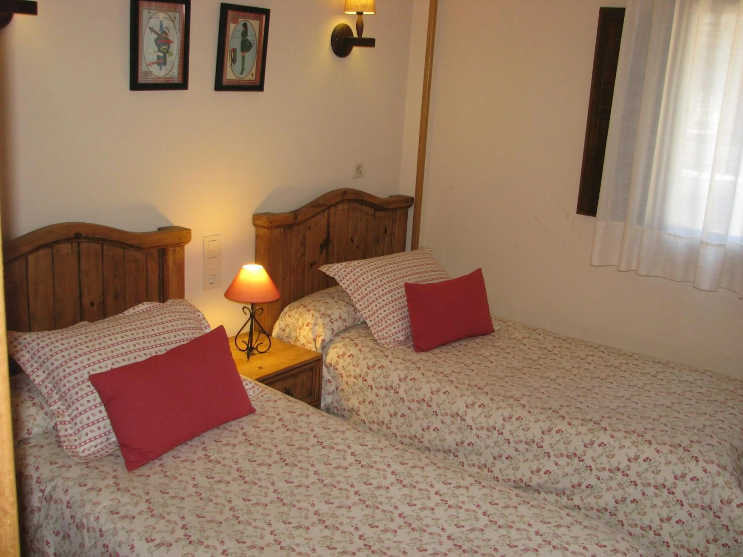 Bed in Aparthotel Sarrato