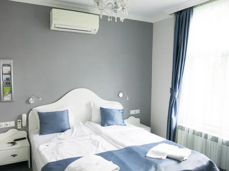 Bed in Family Hotel Belle Epoque Beach