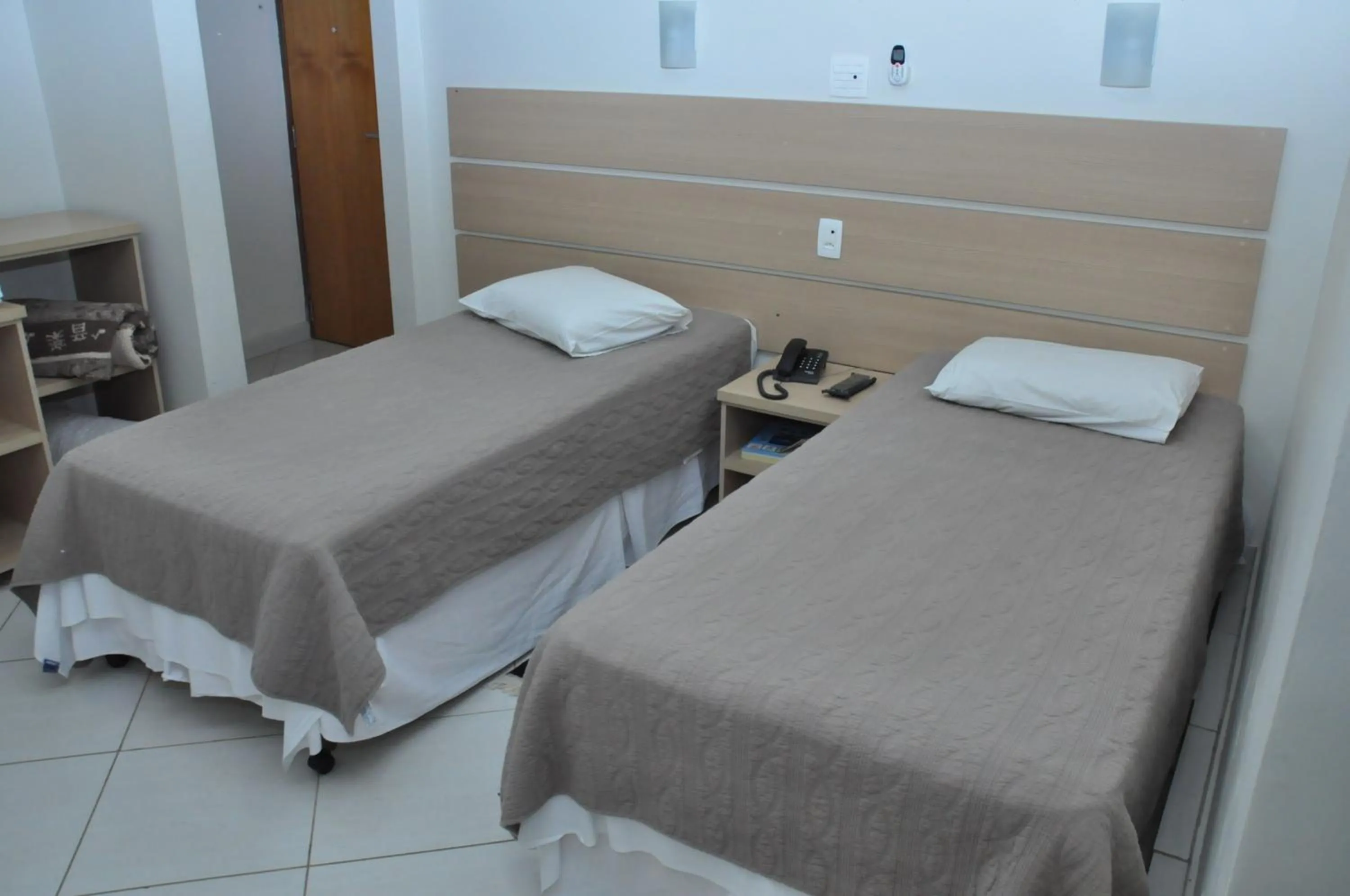 Bed in Hotel Marajó