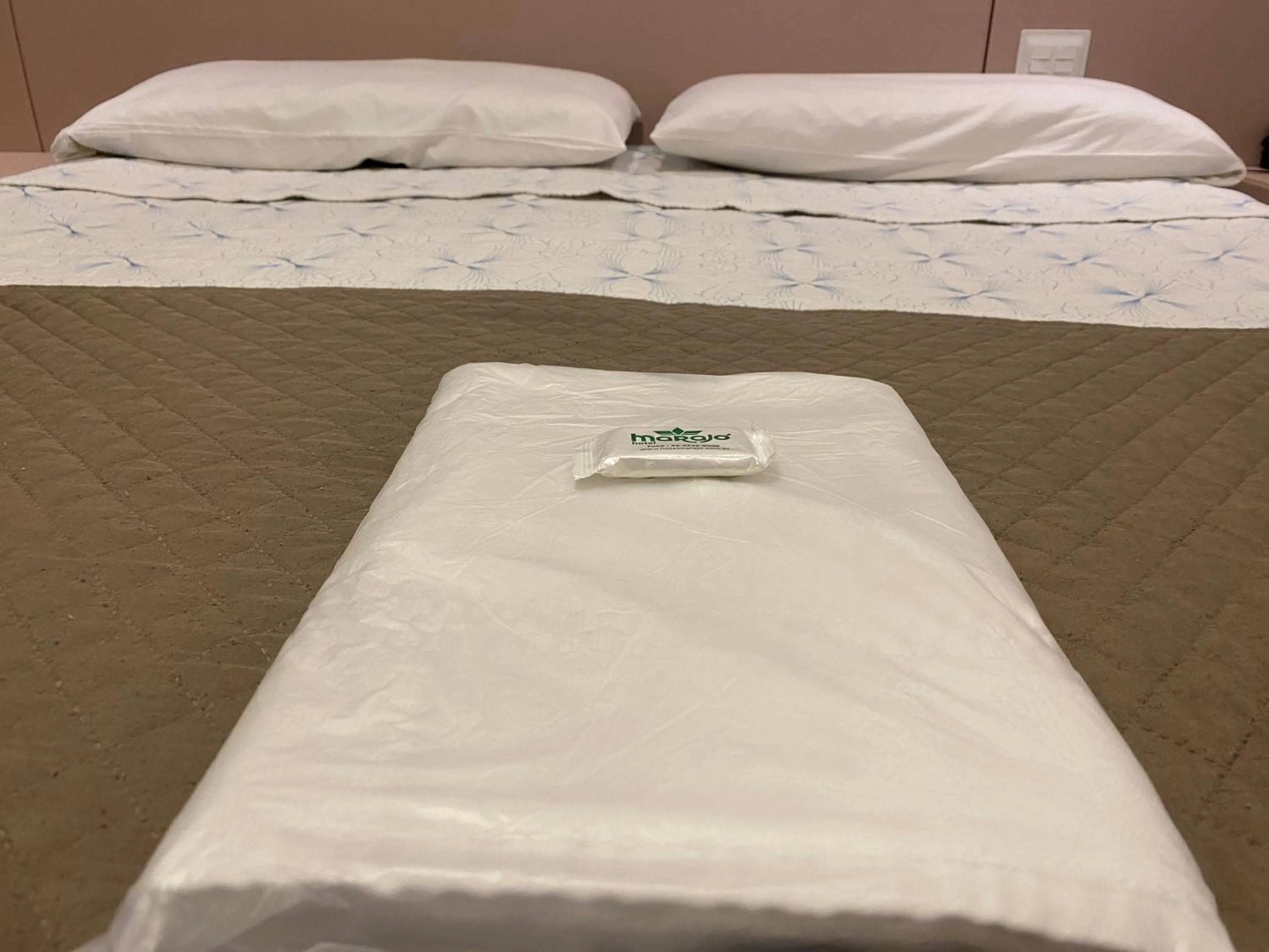 Bed in Hotel Marajó