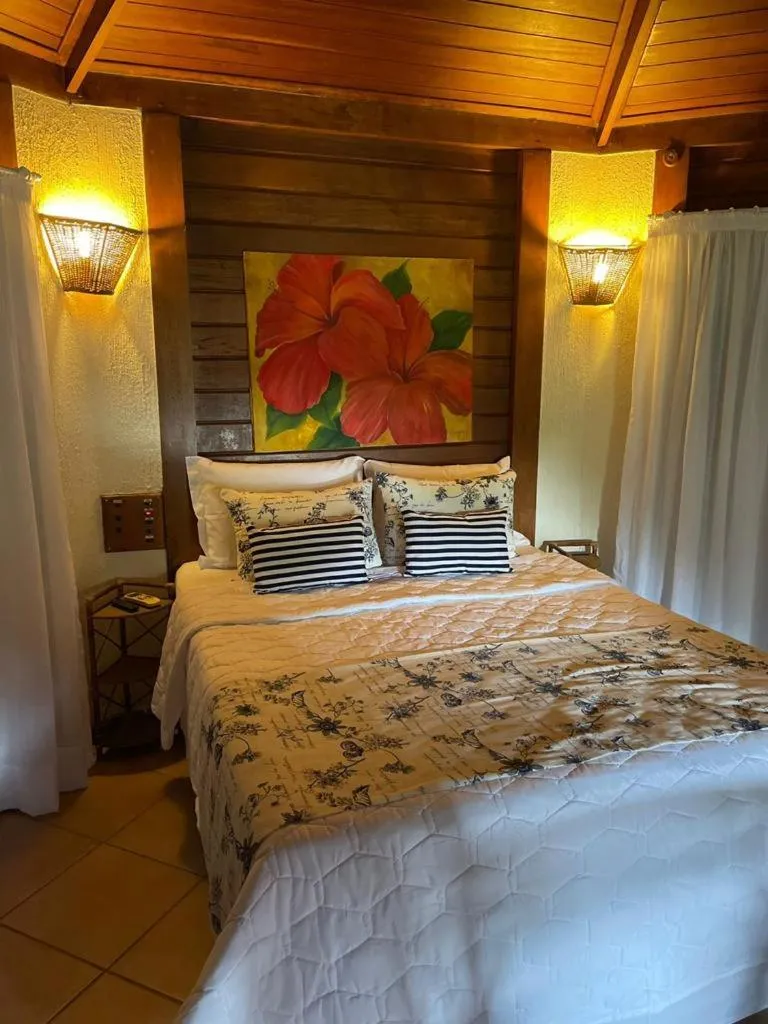 Bed in Pousada Vitorino