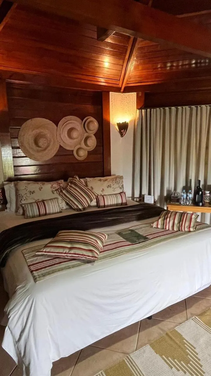 Bed in Pousada Vitorino