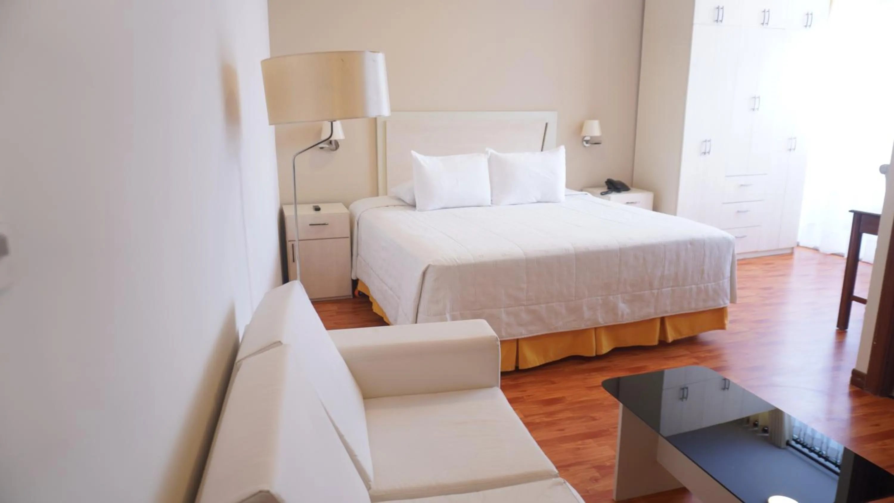 Bed in Delfines Apart Hotel