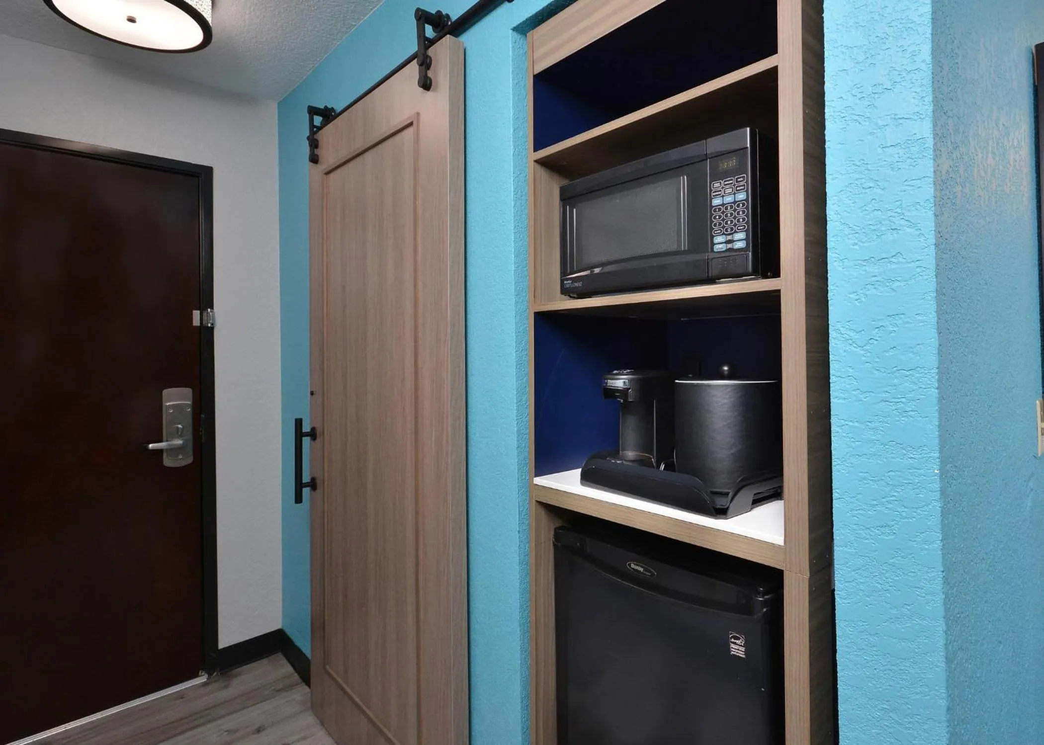 Bedroom in Brookstone Lodge near Biltmore Village, an Ascend Collection Hotel