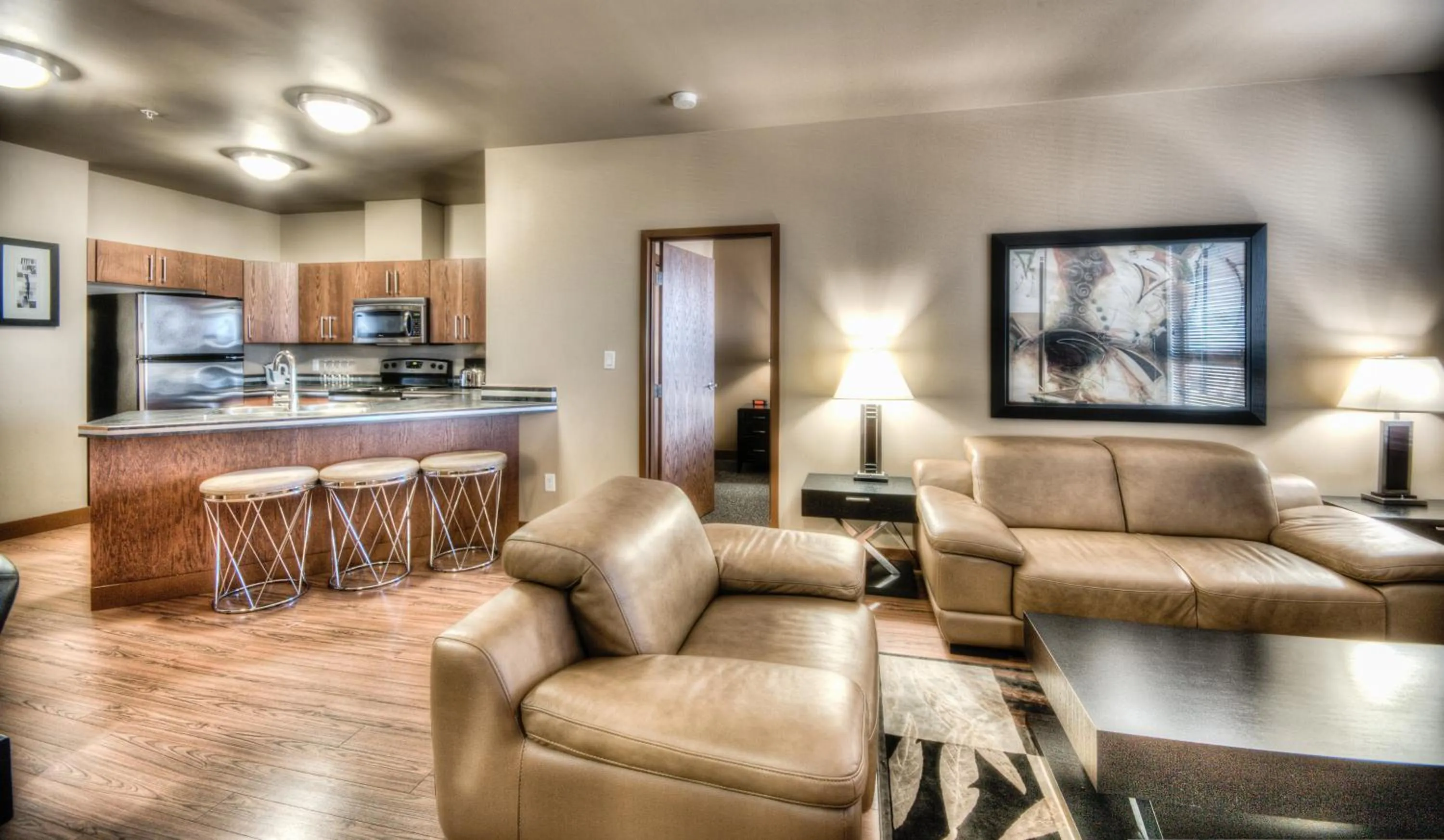 Kitchen or kitchenette in Grand Inn & Residence- Grande Prairie