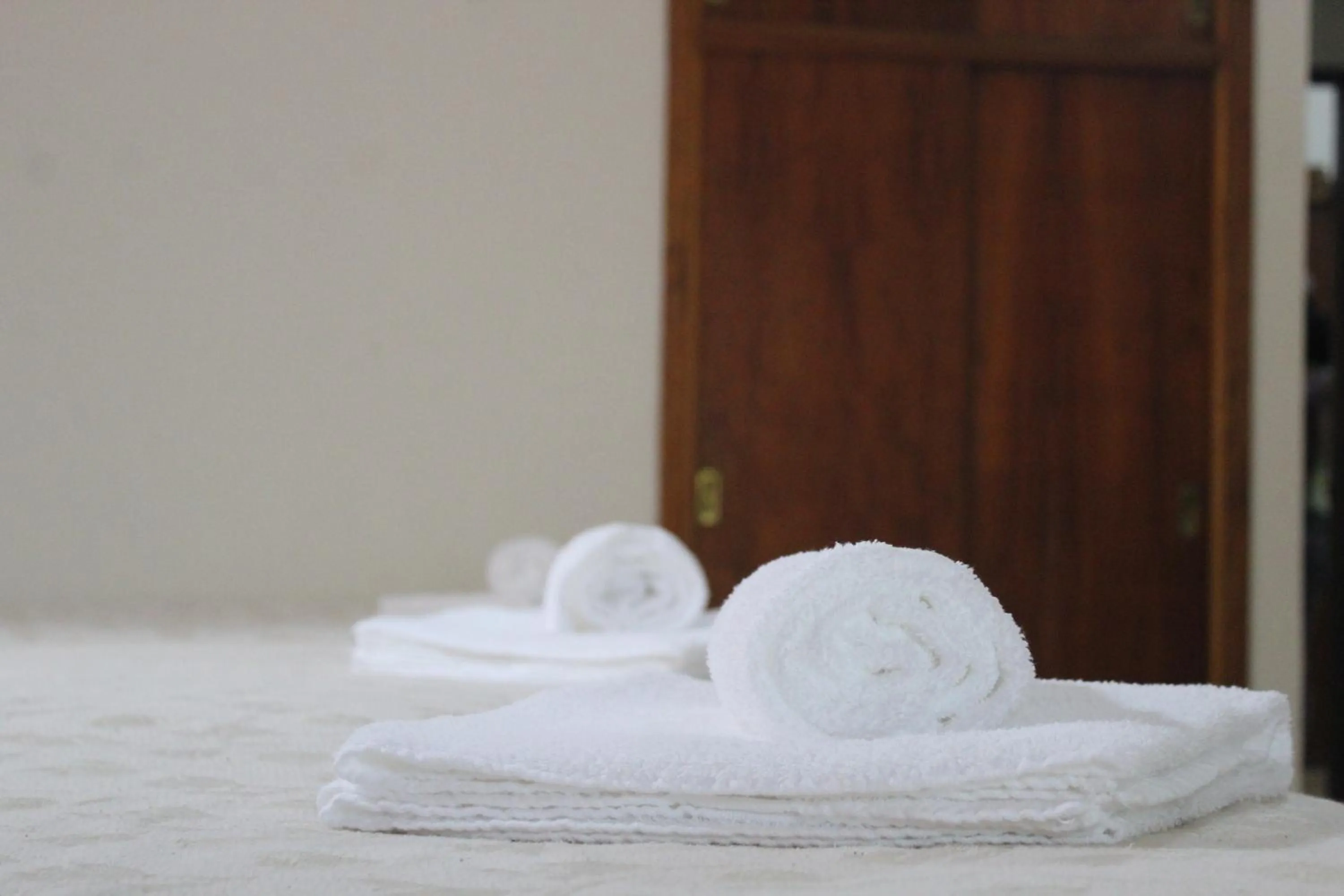 towels, Bed in Palo Rosa Lodge