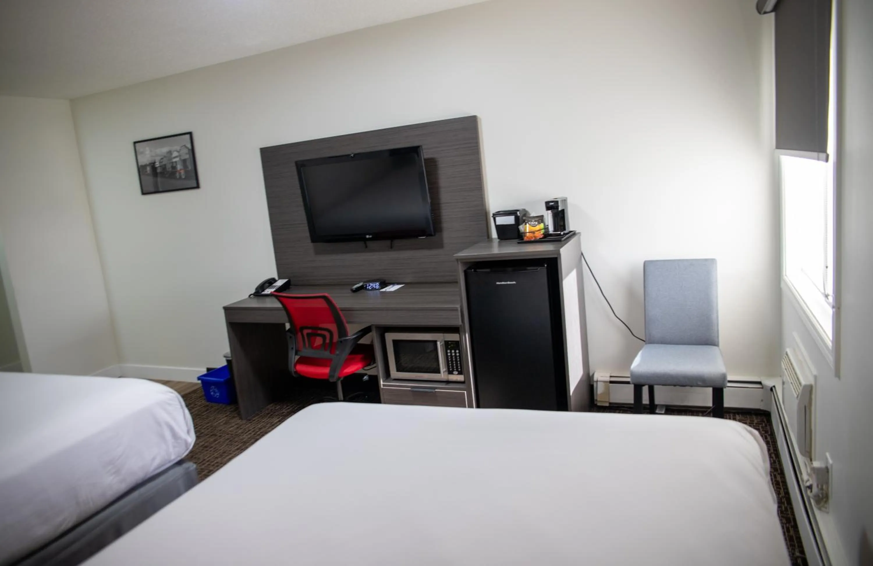 Bed in Ramada by Wyndham Dawson Creek