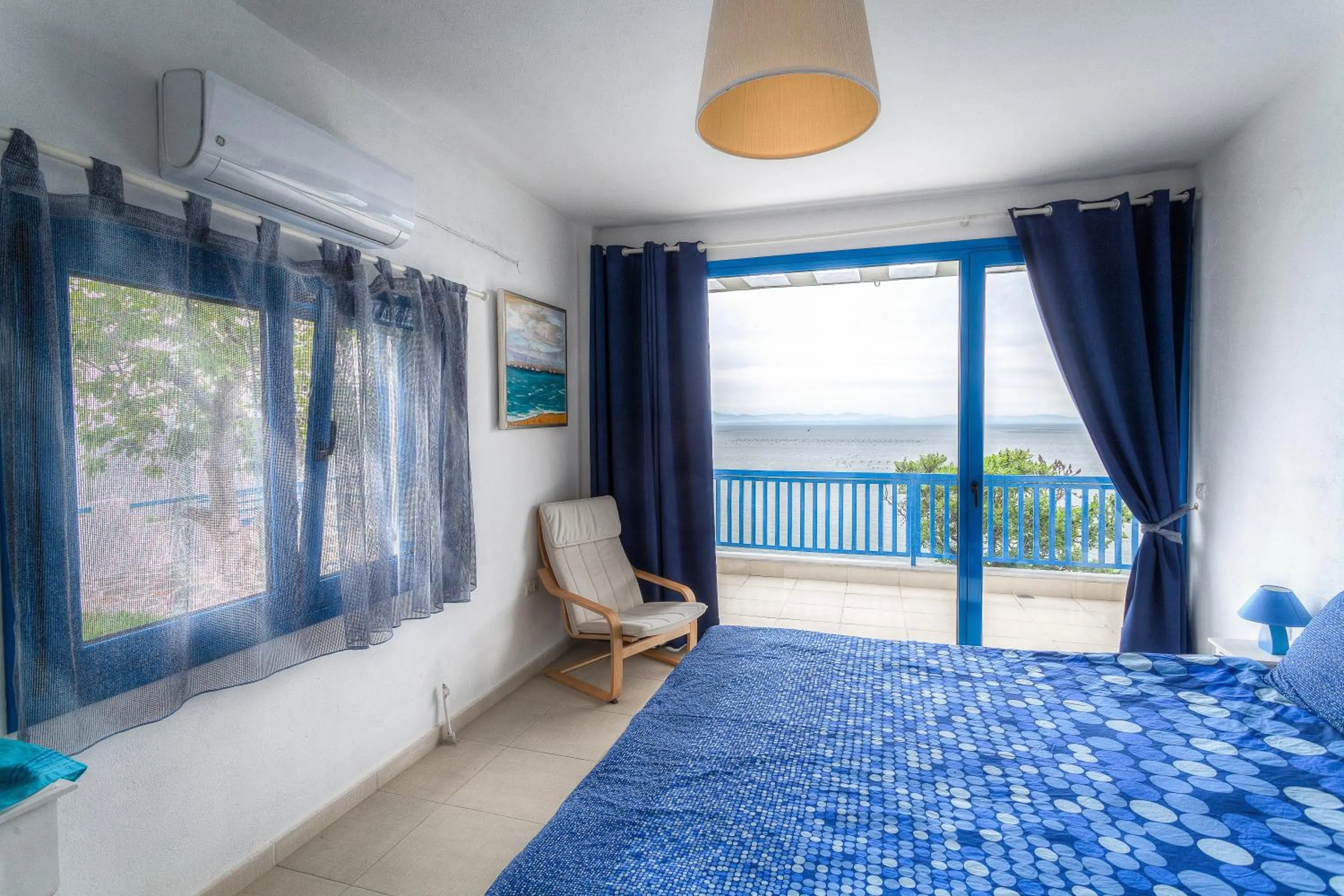 Bed in Navy Greece Villa with swimming pool & sea view