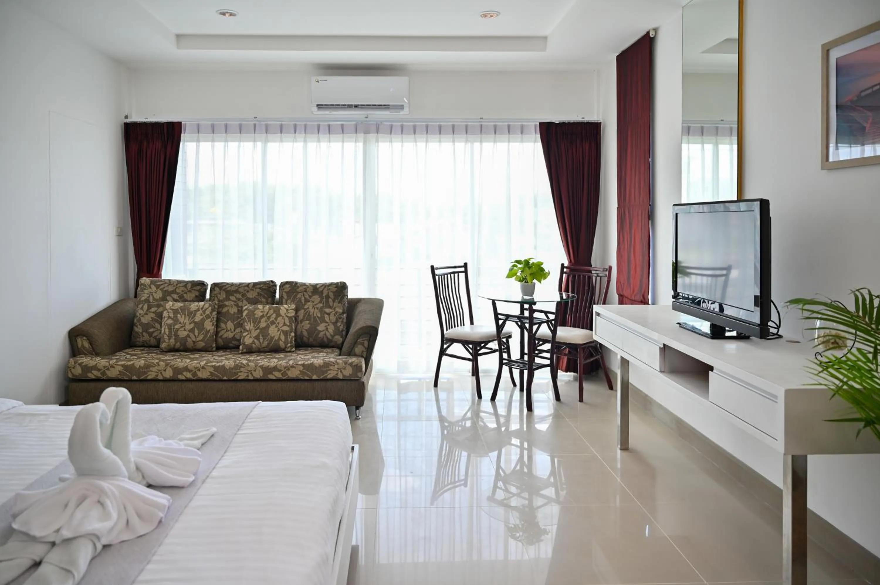 Seating area, Bed in Sivana Place Phuket