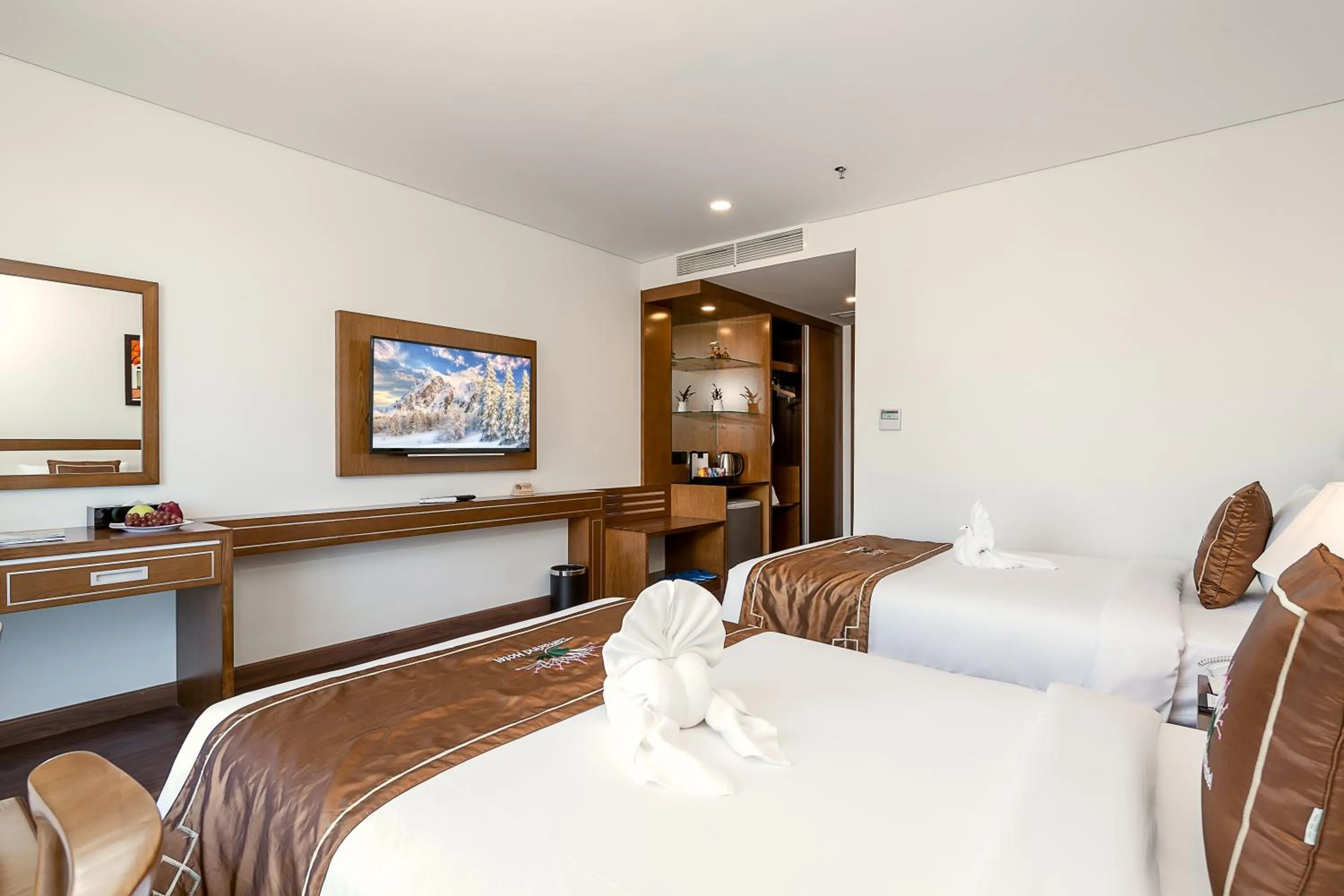 Bed in Tamarind Danang Beach Hotel