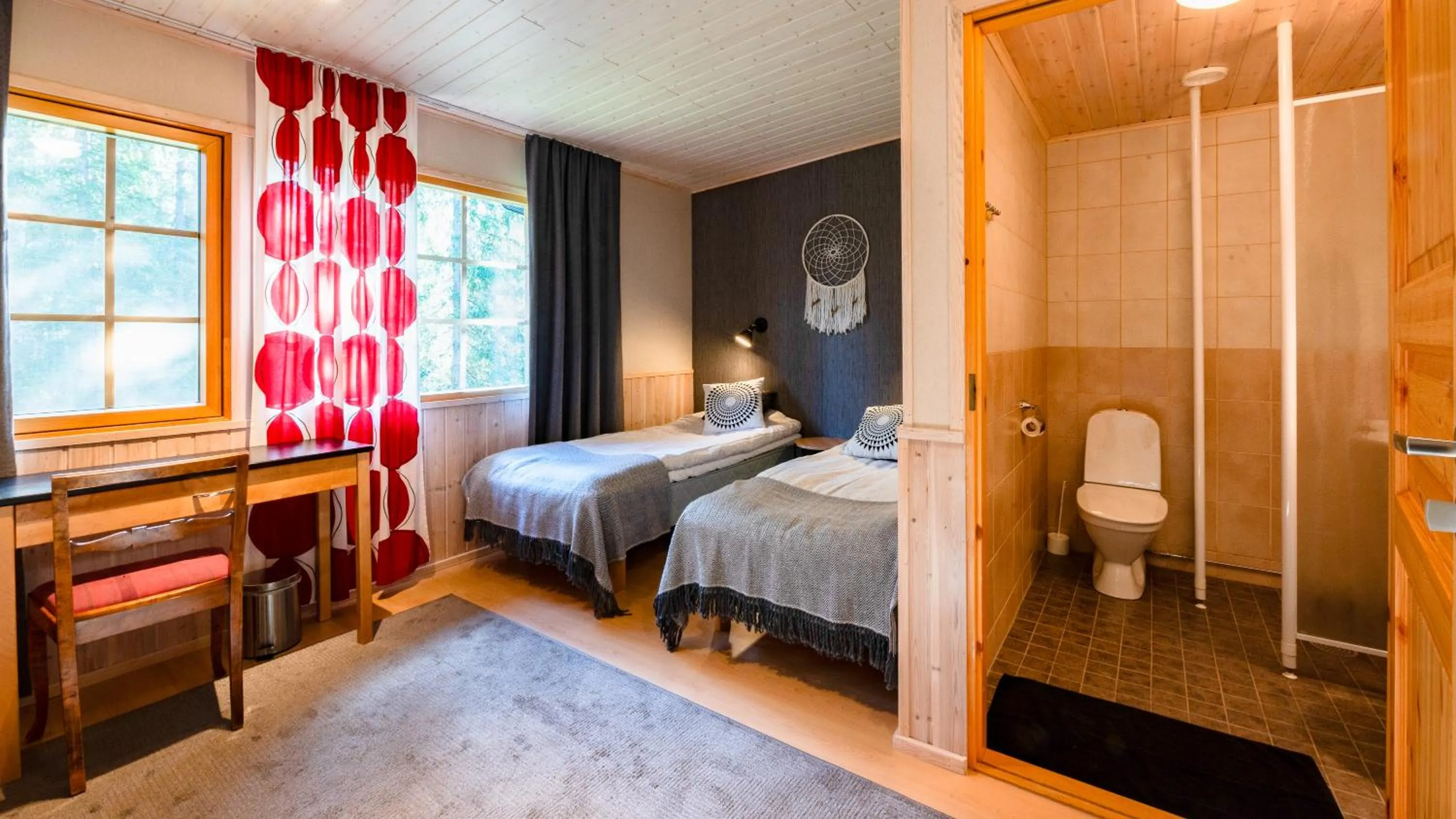 Bed in Isokenkäisten Klubi - Wilderness Lodge