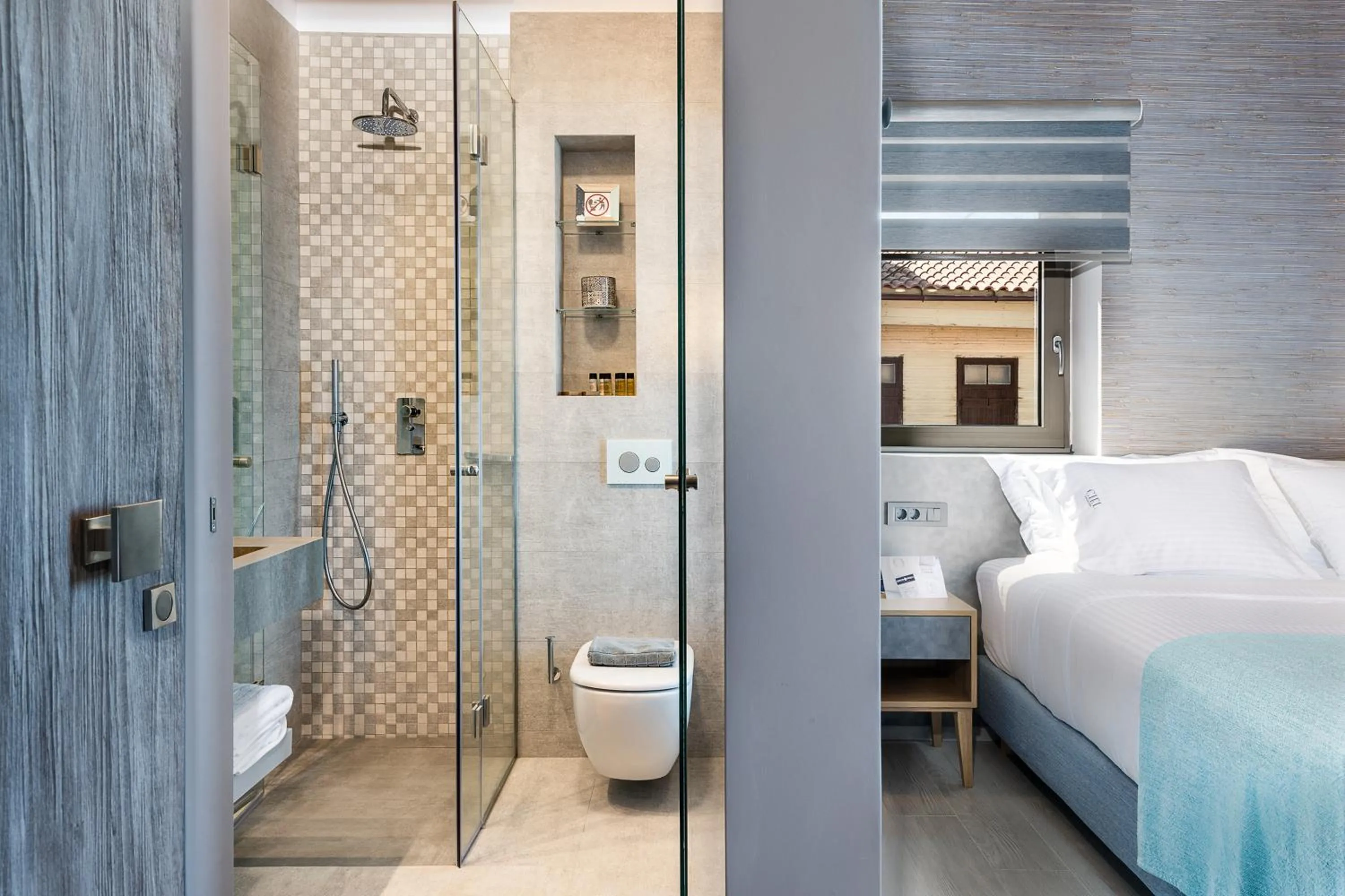 Shower, Bed in Ciel Collection Suites