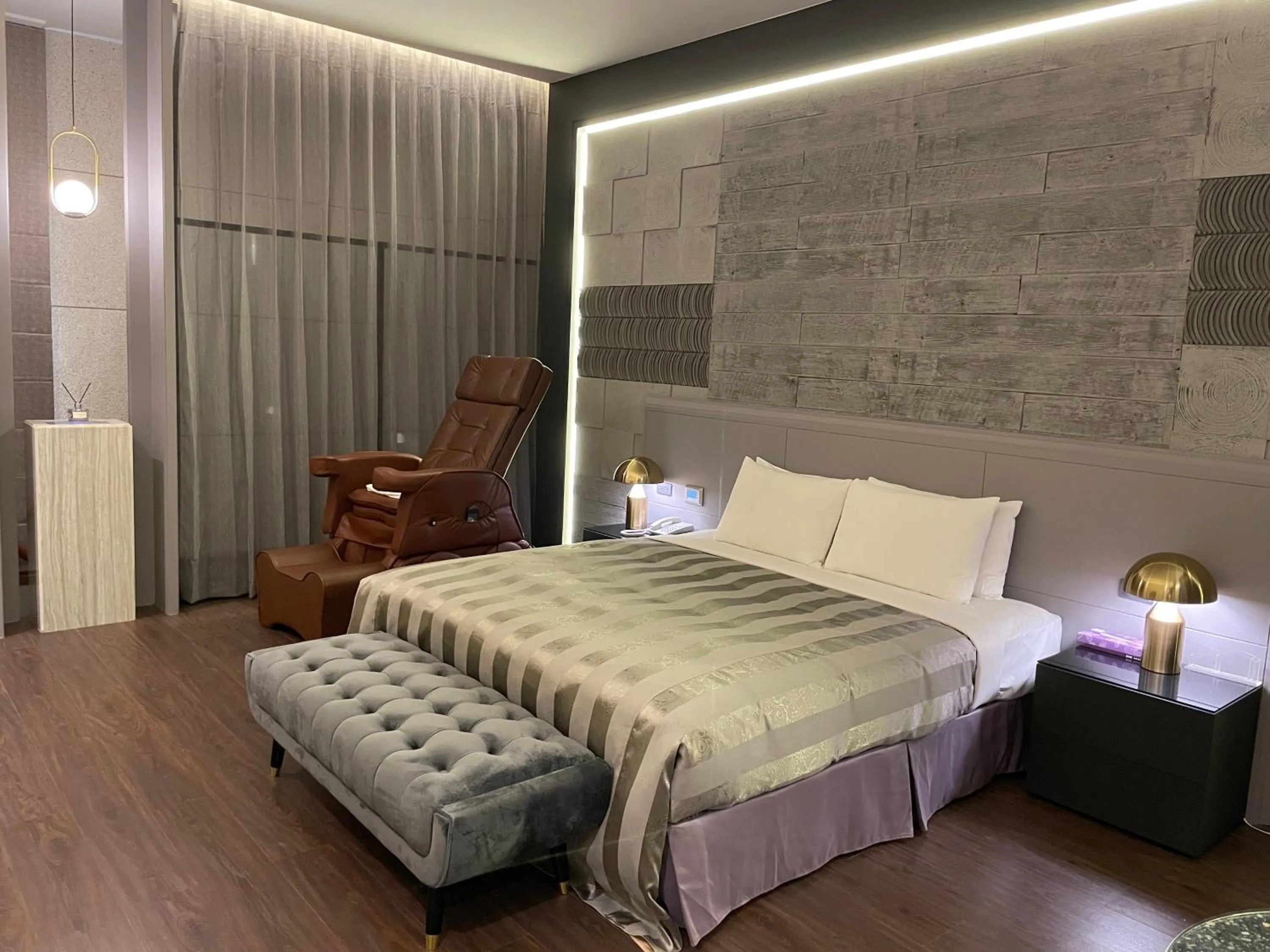 Bed in Purple Garden Motel