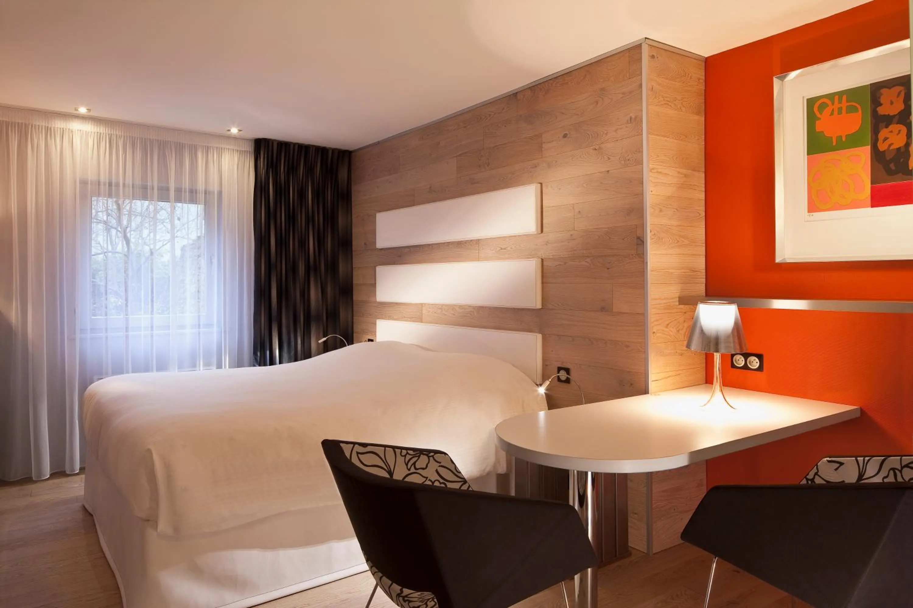 Bed in Hotel Le Colombier Suites