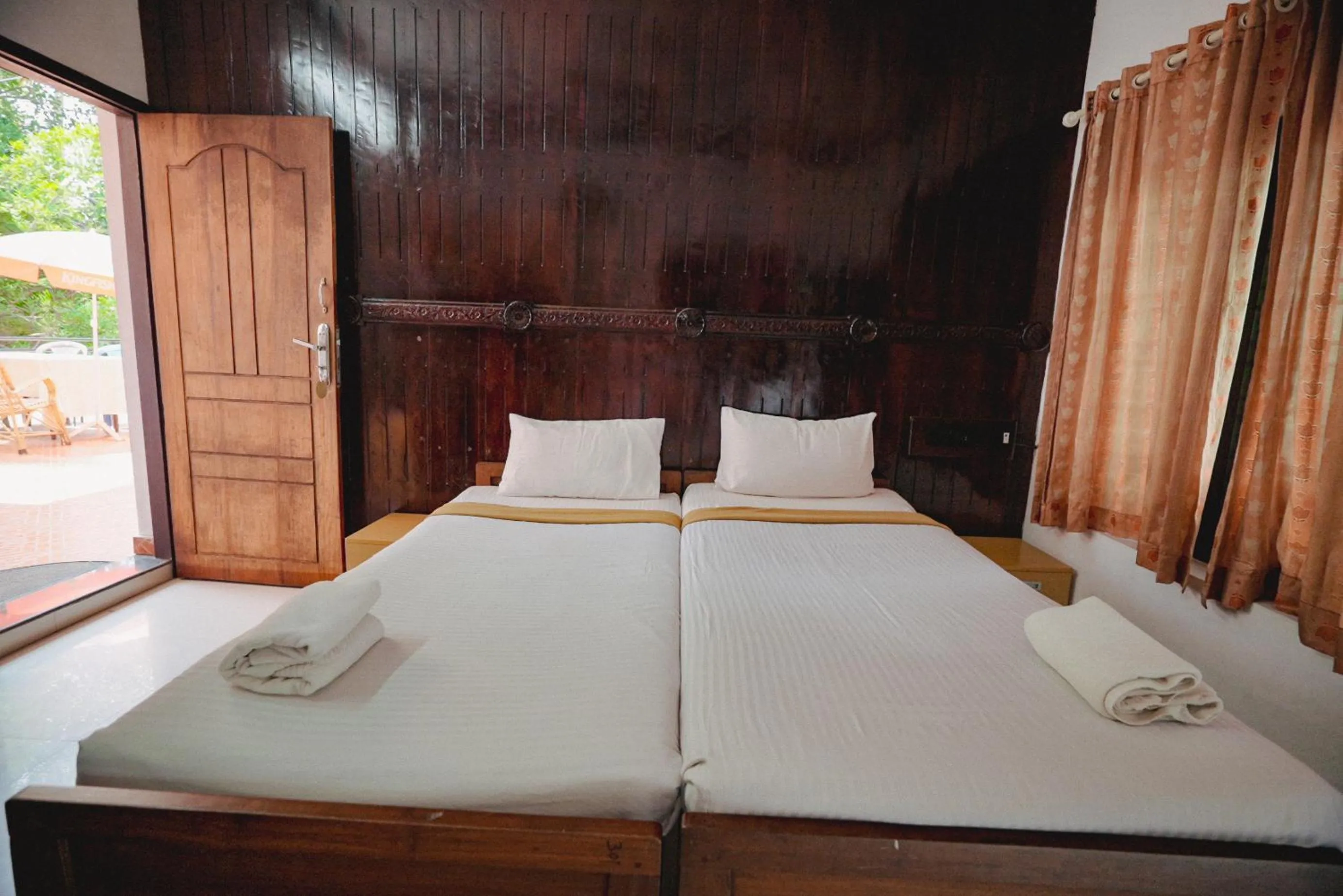 Bed in Raja Park Beach Resort