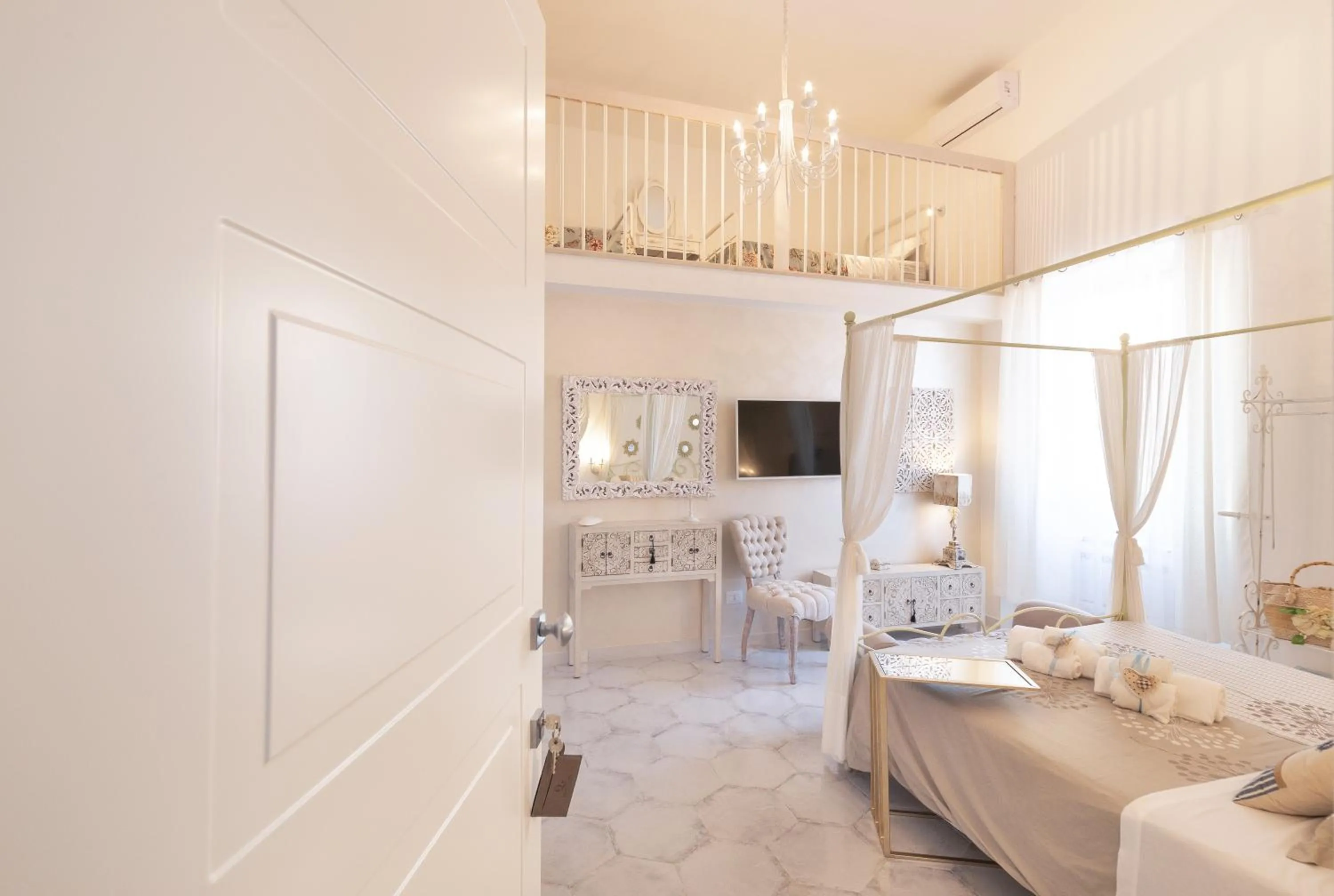 Bed in QuattroCuori Boutique Hotel & Spa