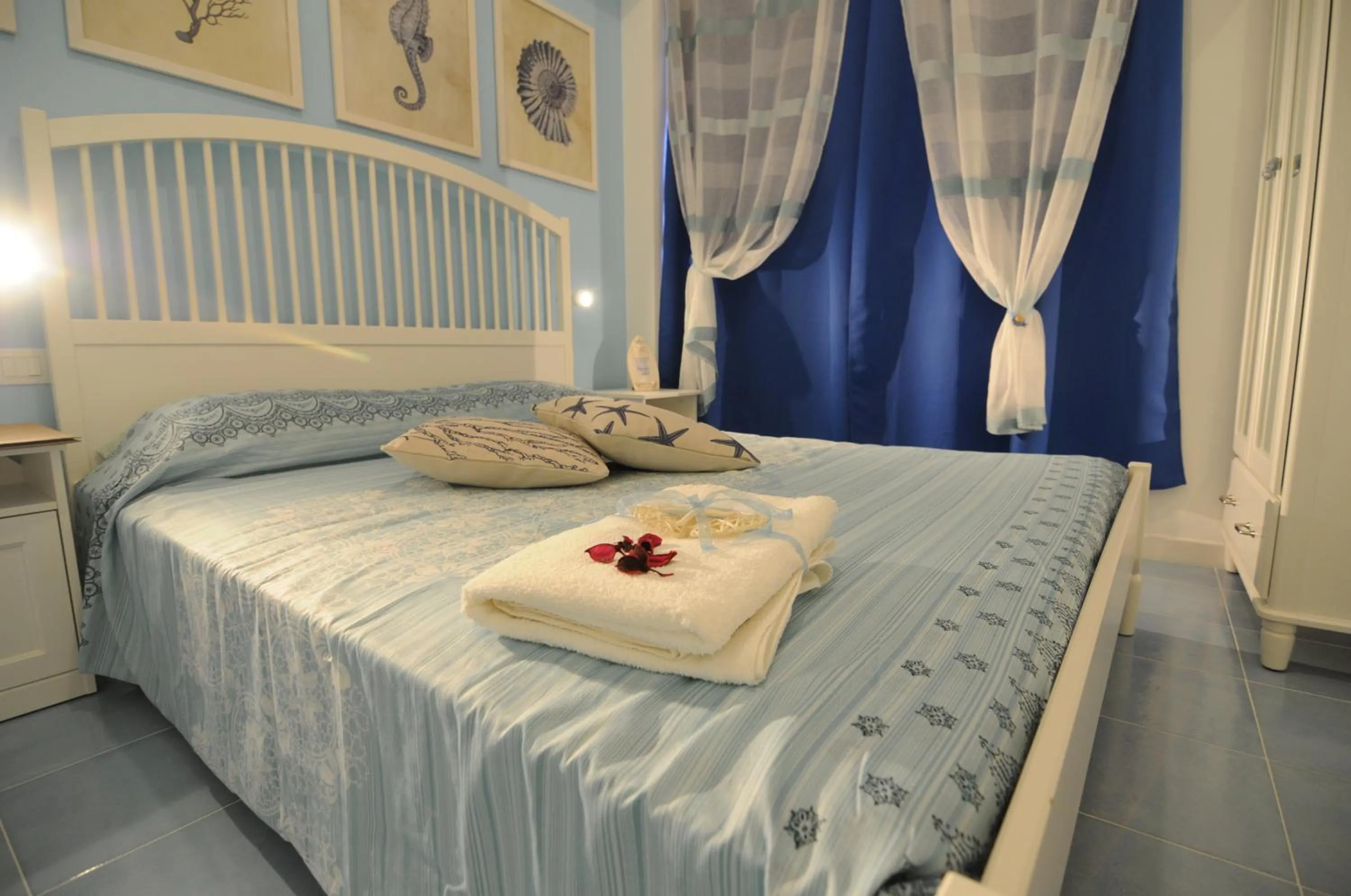 Bed in QuattroCuori Boutique Hotel & Spa