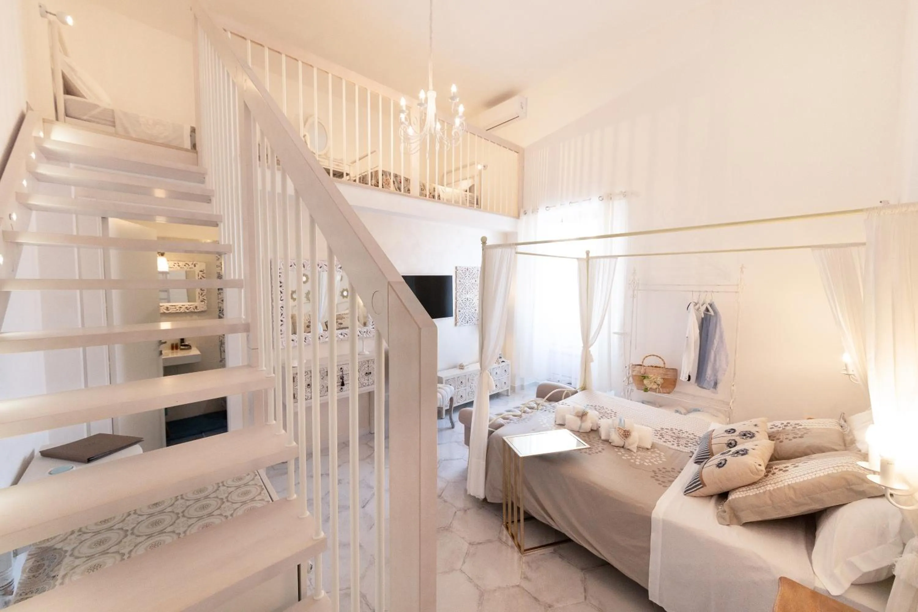 Bed in QuattroCuori Boutique Hotel & Spa