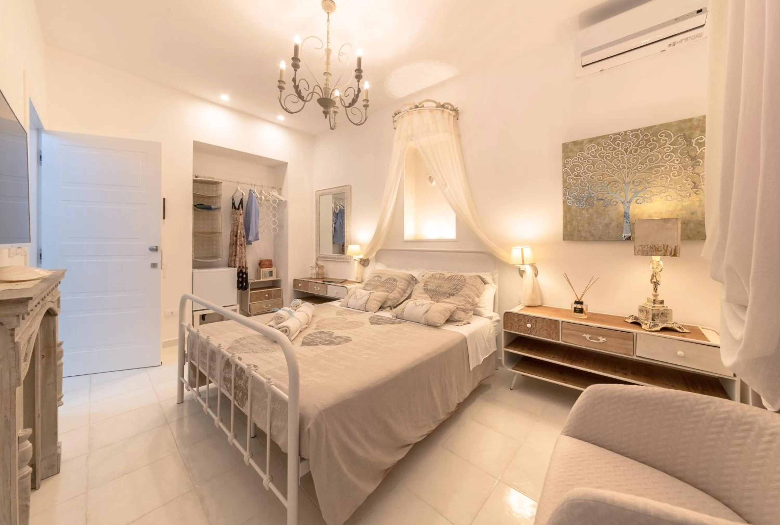 Bed in QuattroCuori Boutique Hotel & Spa