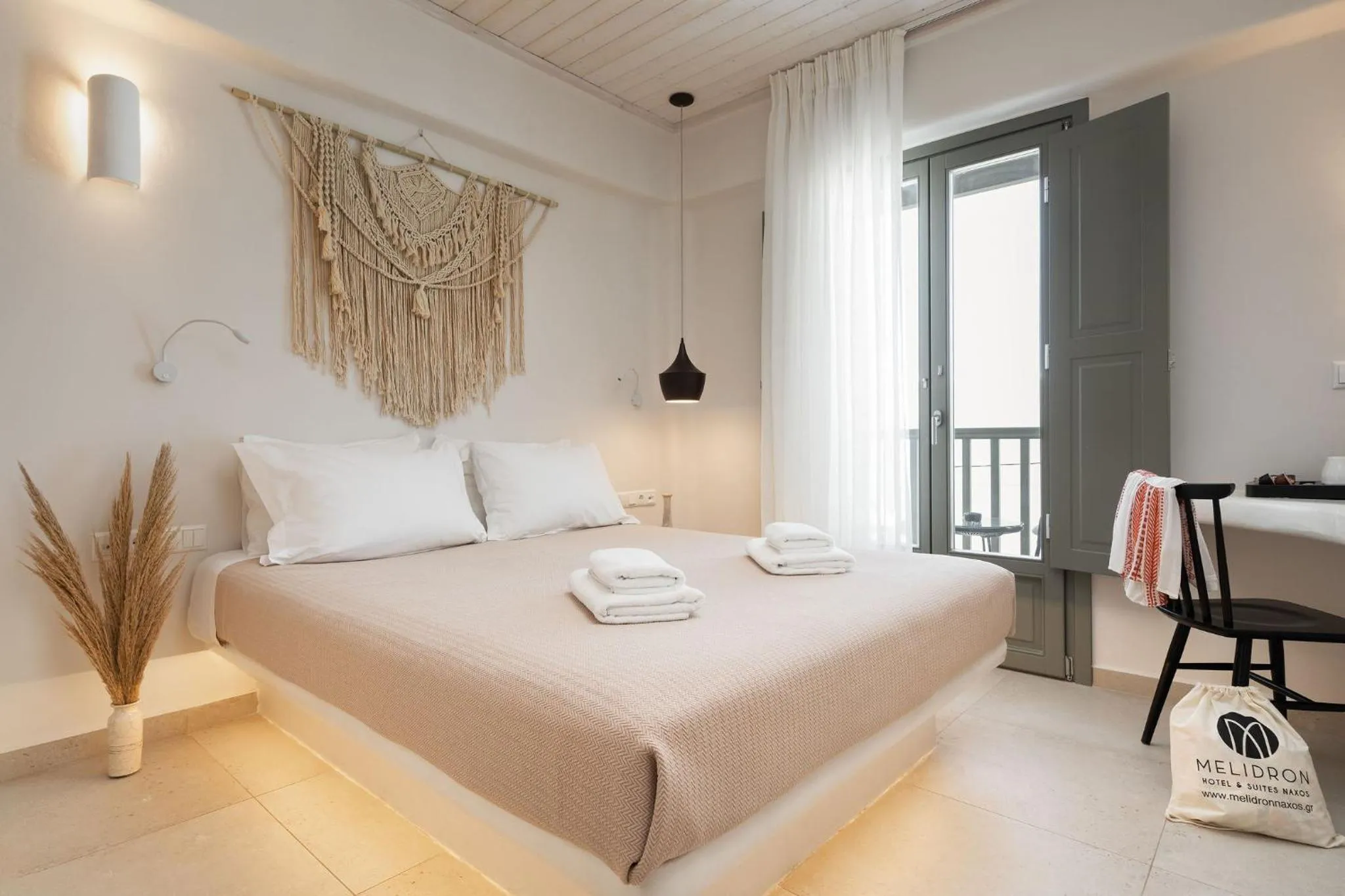 Bed in Melidron Hotel & Suites