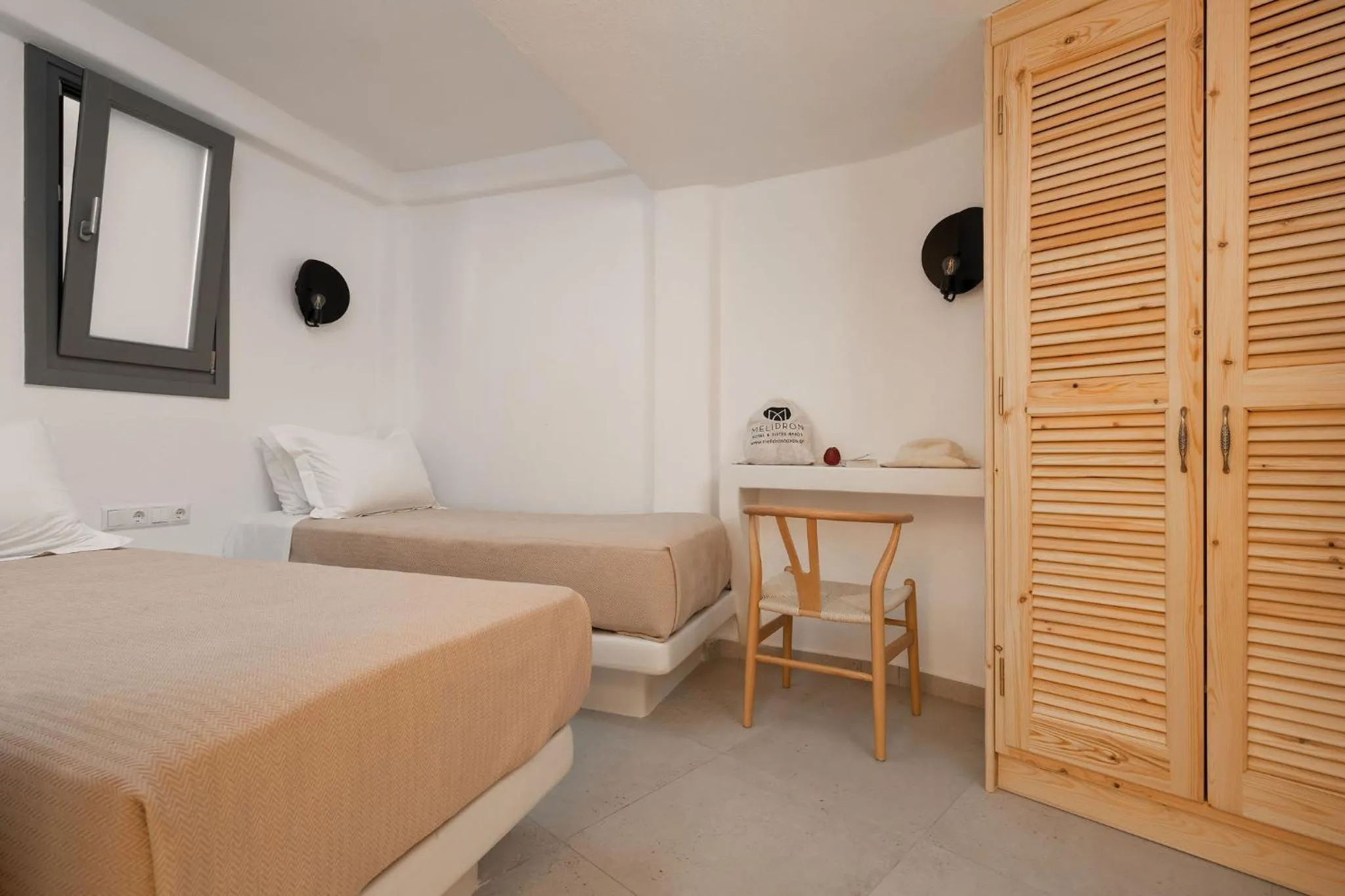 Bed in Melidron Hotel & Suites