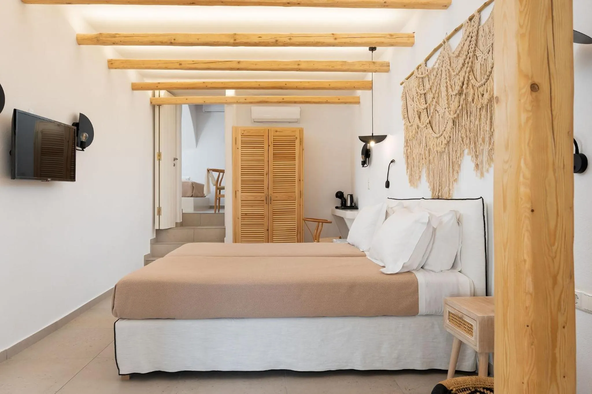 Bed in Melidron Hotel & Suites