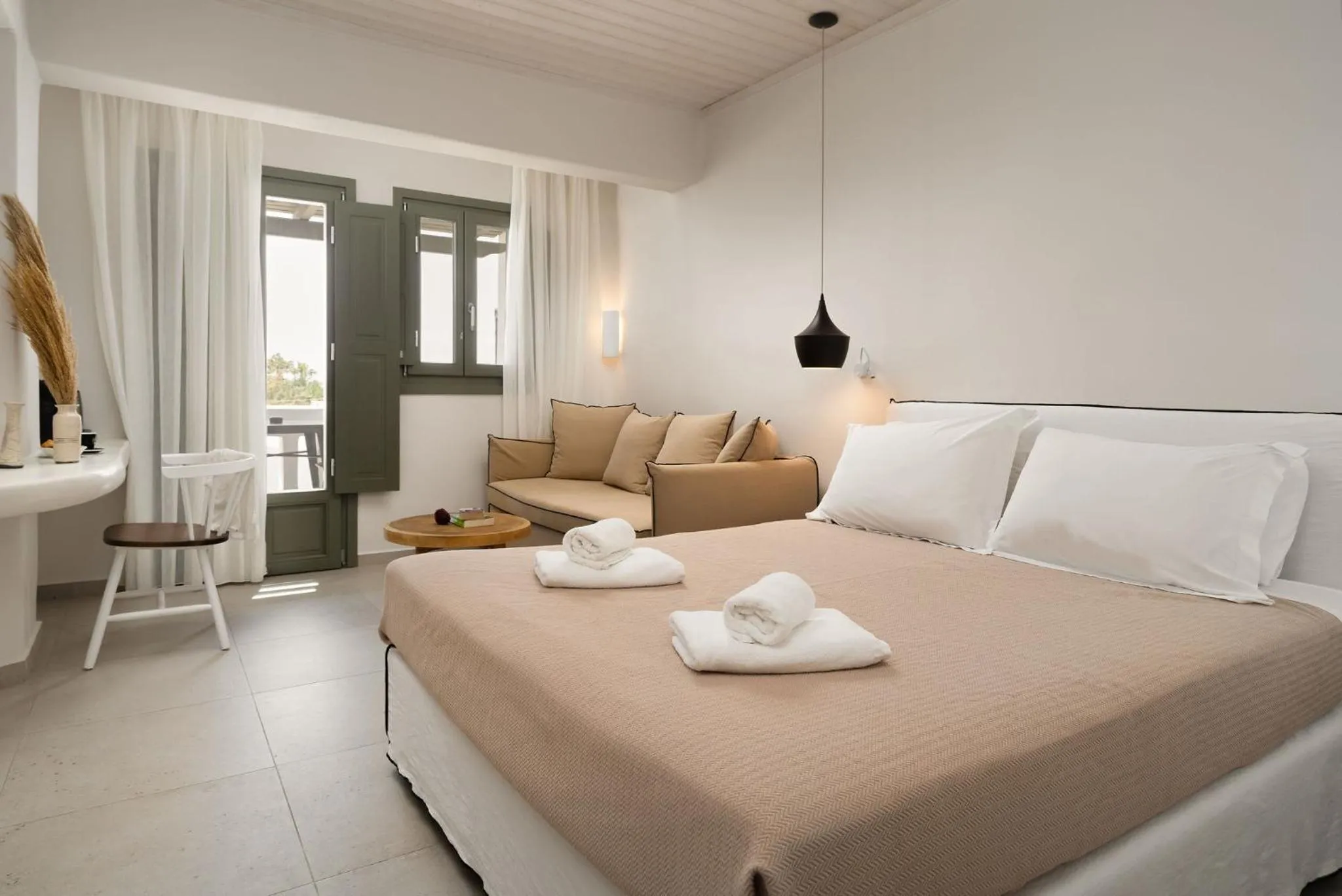 Bed in Melidron Hotel & Suites