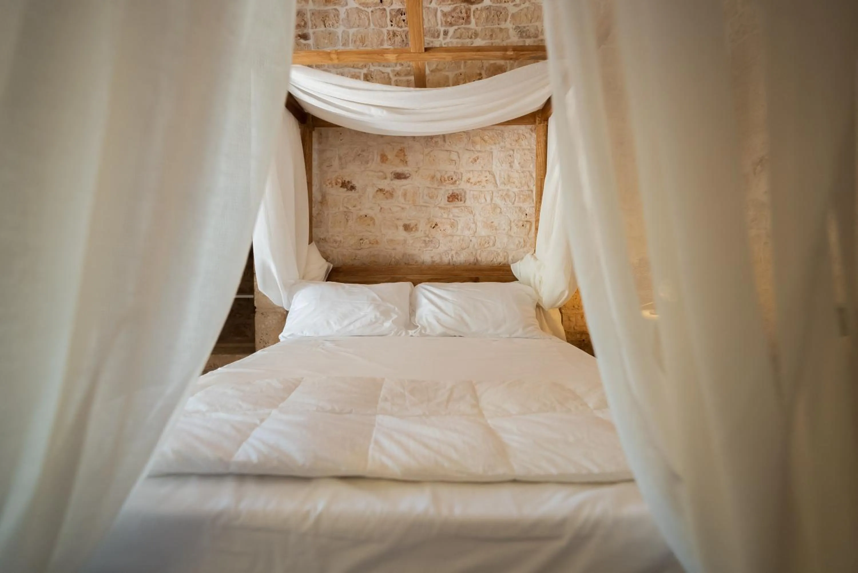 Bed in Masseria Montepaolo Dimora di Charme