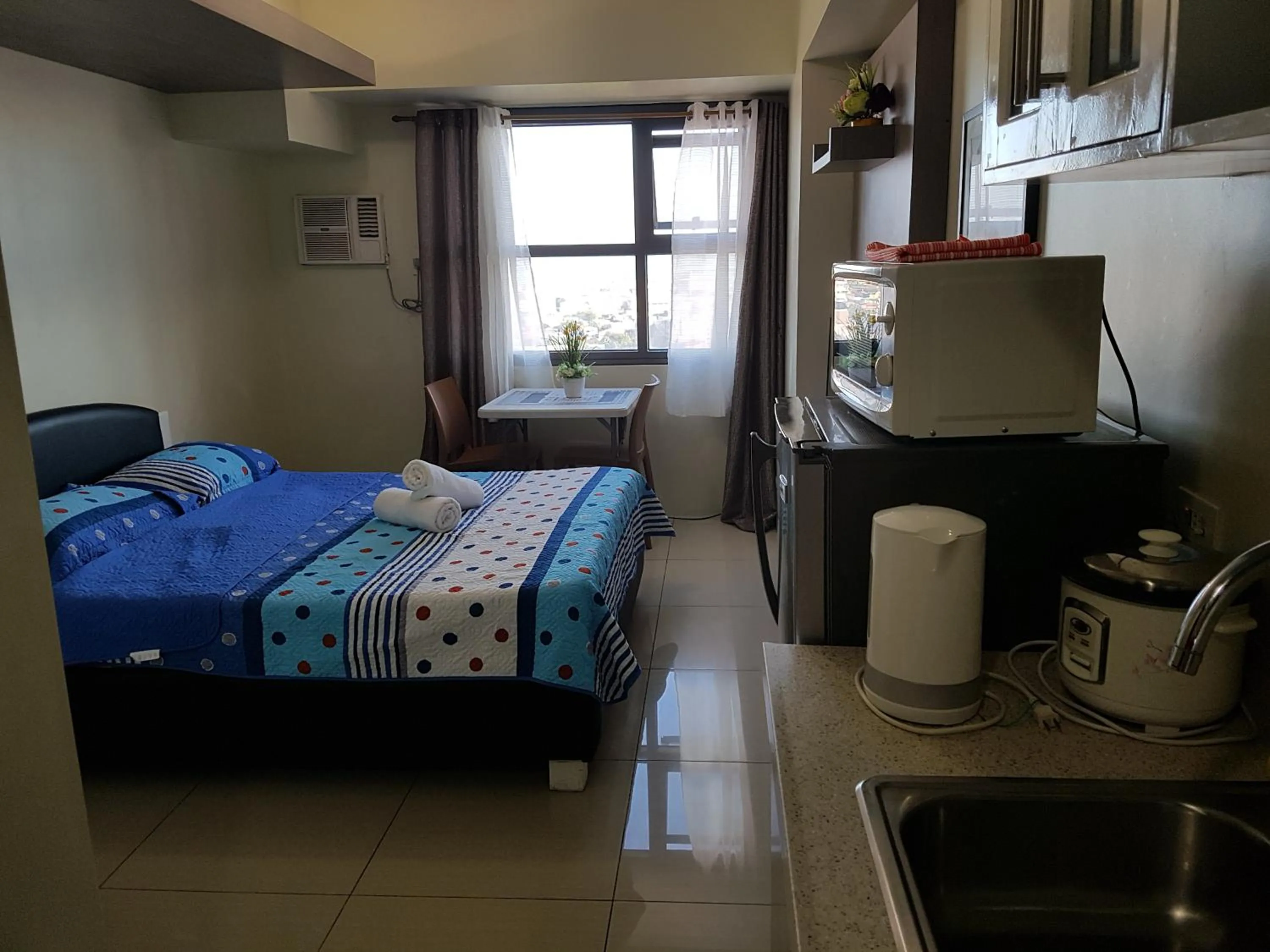 Bed in KC Studio 4 at Horizon 101 Cebu