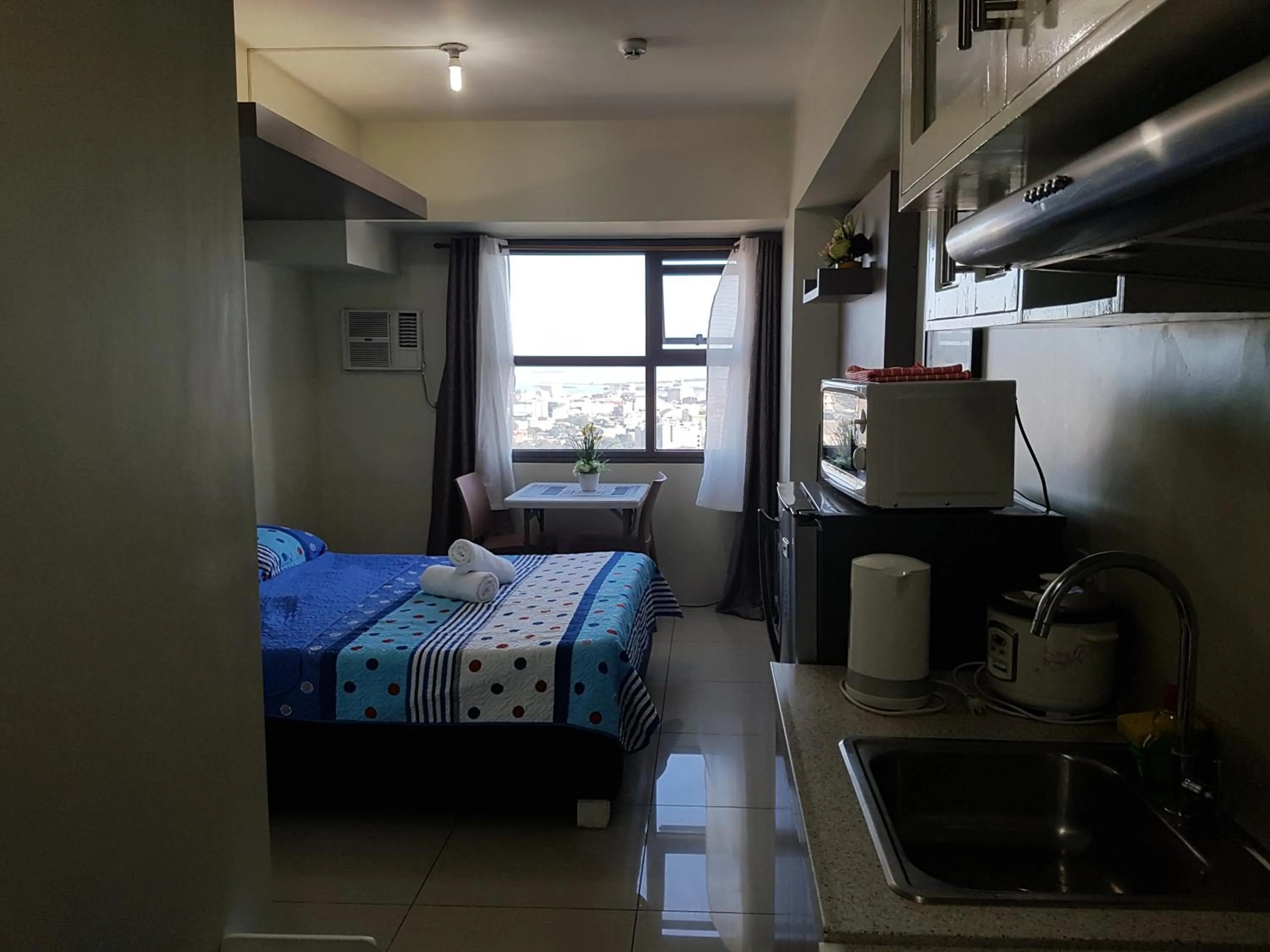 Bed in KC Studio 4 at Horizon 101 Cebu