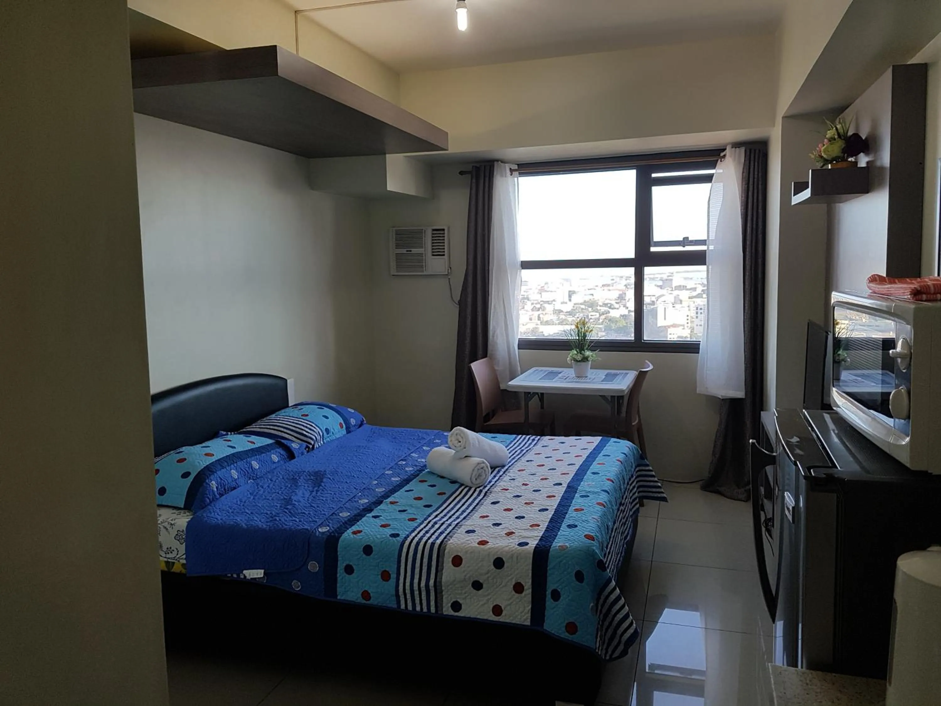 Bed in KC Studio 4 at Horizon 101 Cebu