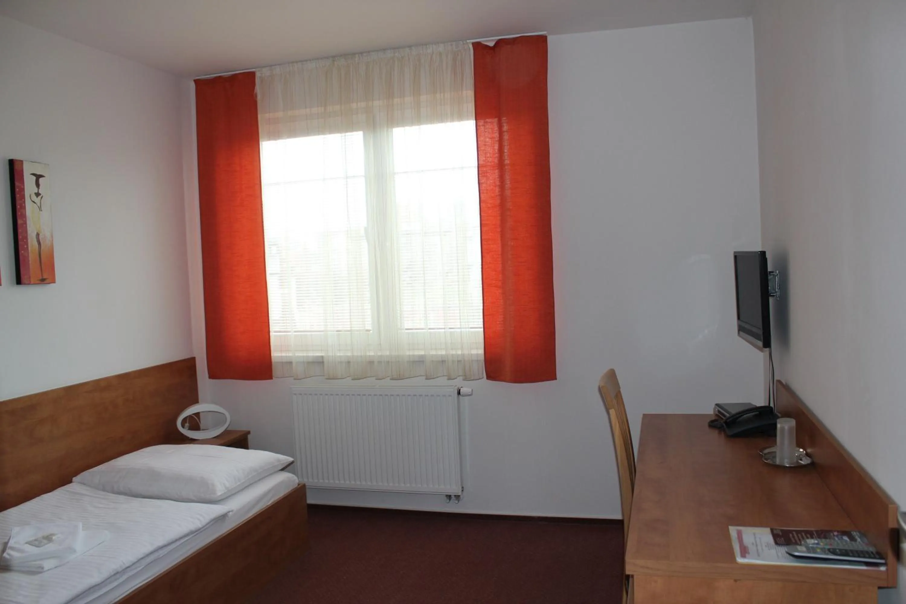 Bedroom in Hotel Olympionik