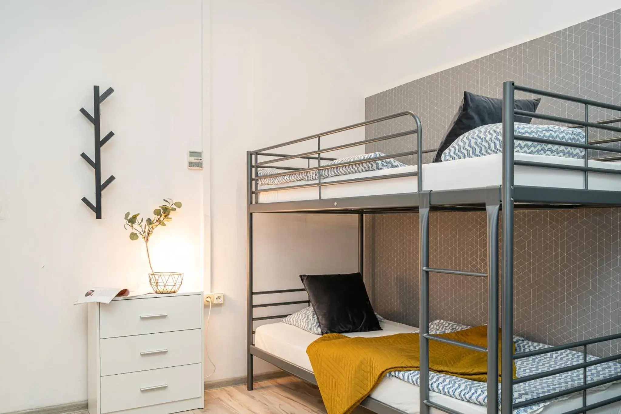 Triple Room with Shared Bathroom in Absynt Hostel Wrocław Triple Room with Shared Bathroom in Absynt Hostel Wrocław