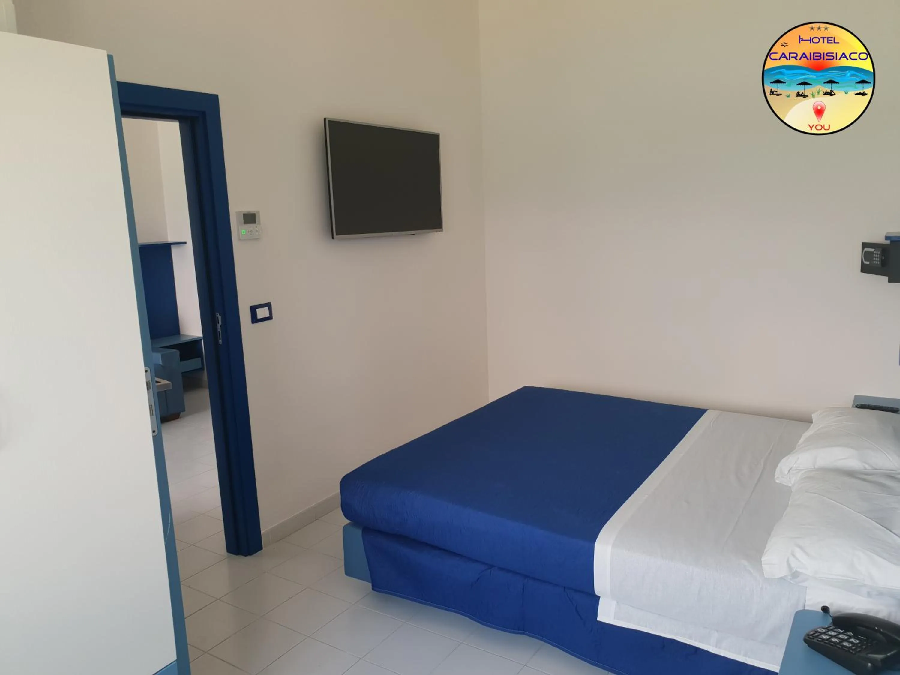 Bed in Hotel Caraibisiaco sul mare